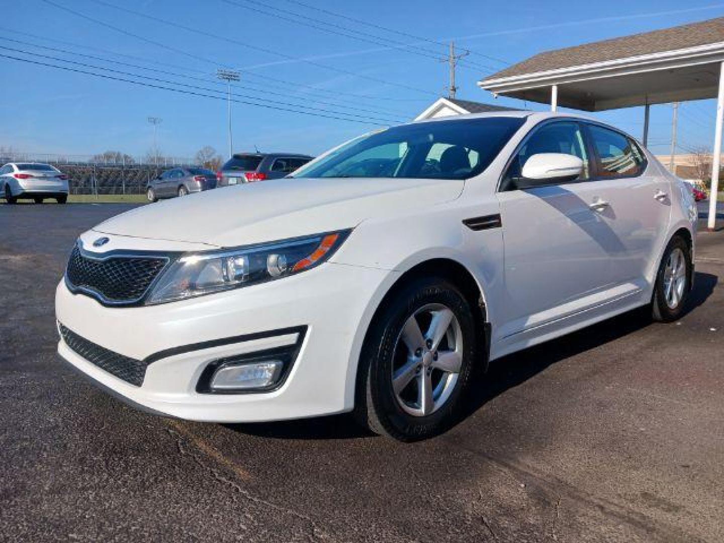 2015 Snow White Pearl Kia Optima LX (KNAGM4A71F5) with an 2.4L L4 DOHC 16V engine, 6-Speed Automatic transmission, located at 880 E. National Road, Vandalia, OH, 45377, (937) 908-9800, 39.892189, -84.181015 - Photo#2