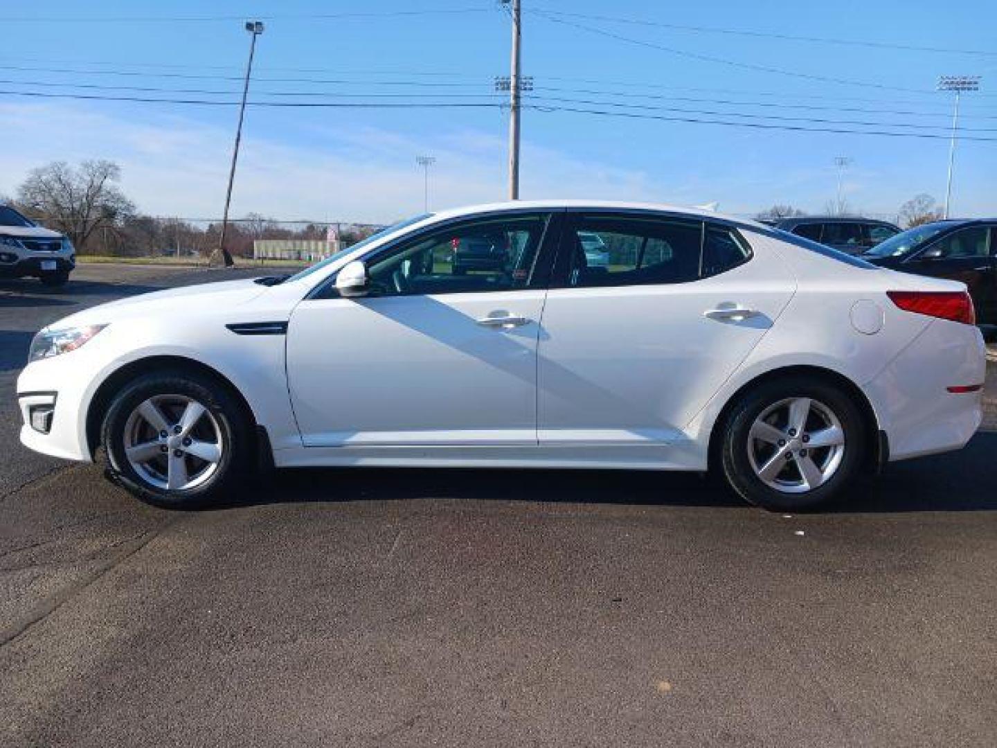 2015 Snow White Pearl Kia Optima LX (KNAGM4A71F5) with an 2.4L L4 DOHC 16V engine, 6-Speed Automatic transmission, located at 880 E. National Road, Vandalia, OH, 45377, (937) 908-9800, 39.892189, -84.181015 - Photo#3