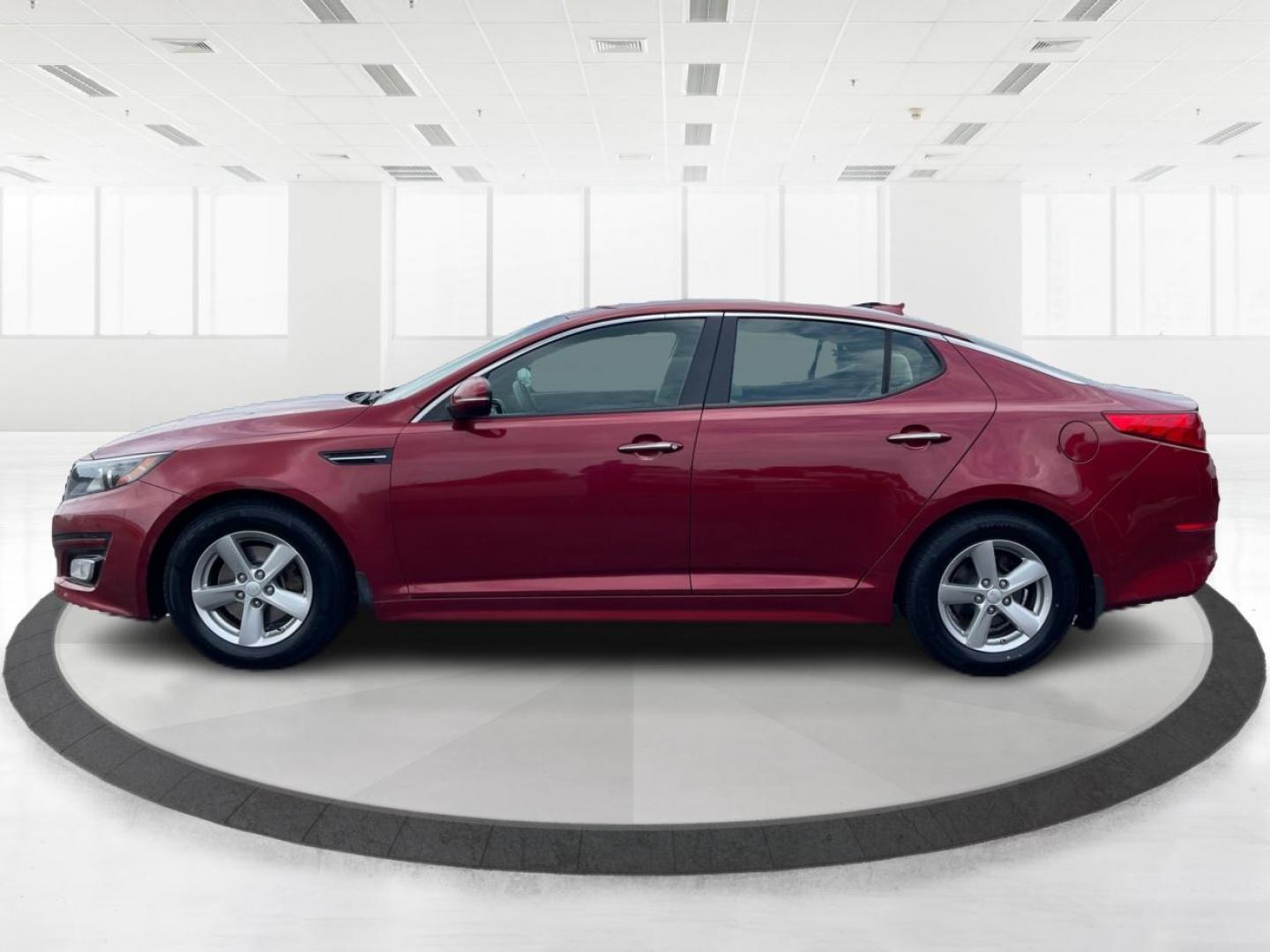 2015 Remington Red Metallic Kia Optima LX (5XXGM4A79FG) with an 2.4L L4 DOHC 16V engine, 6-Speed Automatic transmission, located at 880 E. National Road, Vandalia, OH, 45377, (937) 908-9800, 39.892189, -84.181015 - Photo#5