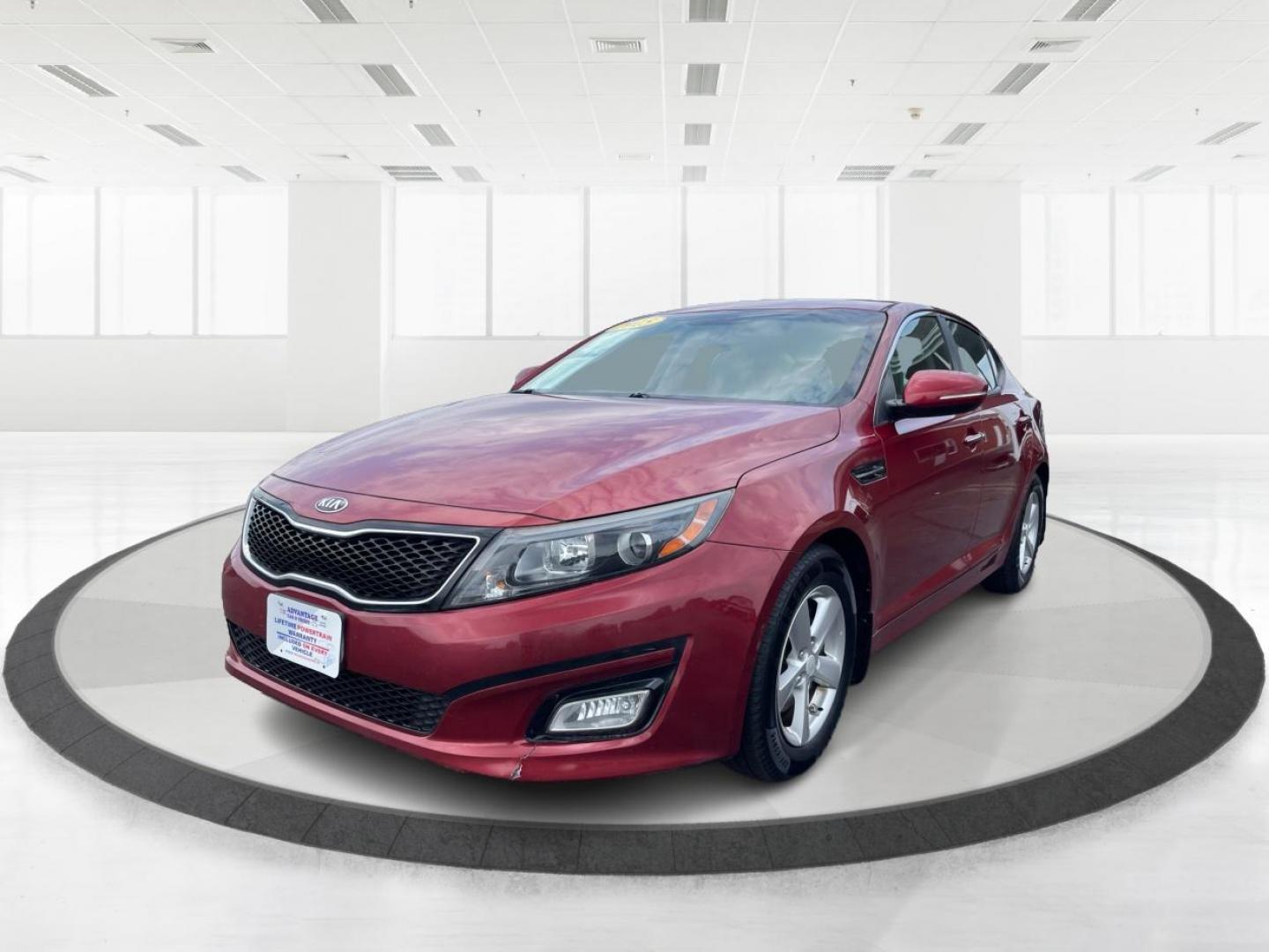 2015 Remington Red Metallic Kia Optima LX (5XXGM4A79FG) with an 2.4L L4 DOHC 16V engine, 6-Speed Automatic transmission, located at 880 E. National Road, Vandalia, OH, 45377, (937) 908-9800, 39.892189, -84.181015 - Photo#7