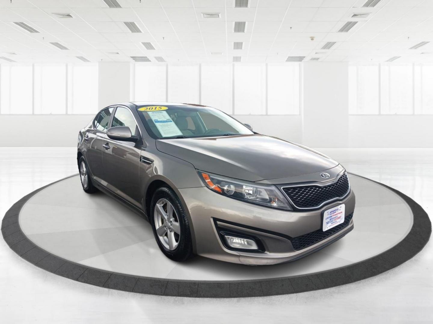 2015 Satin Metal Kia Optima (5XXGM4A77FG) with an 2.4L L4 DOHC 16V engine, 6-Speed Automatic transmission, located at 401 Woodman Dr, Riverside, OH, 45431, (937) 908-9800, 39.763779, -84.122063 - Photo#0