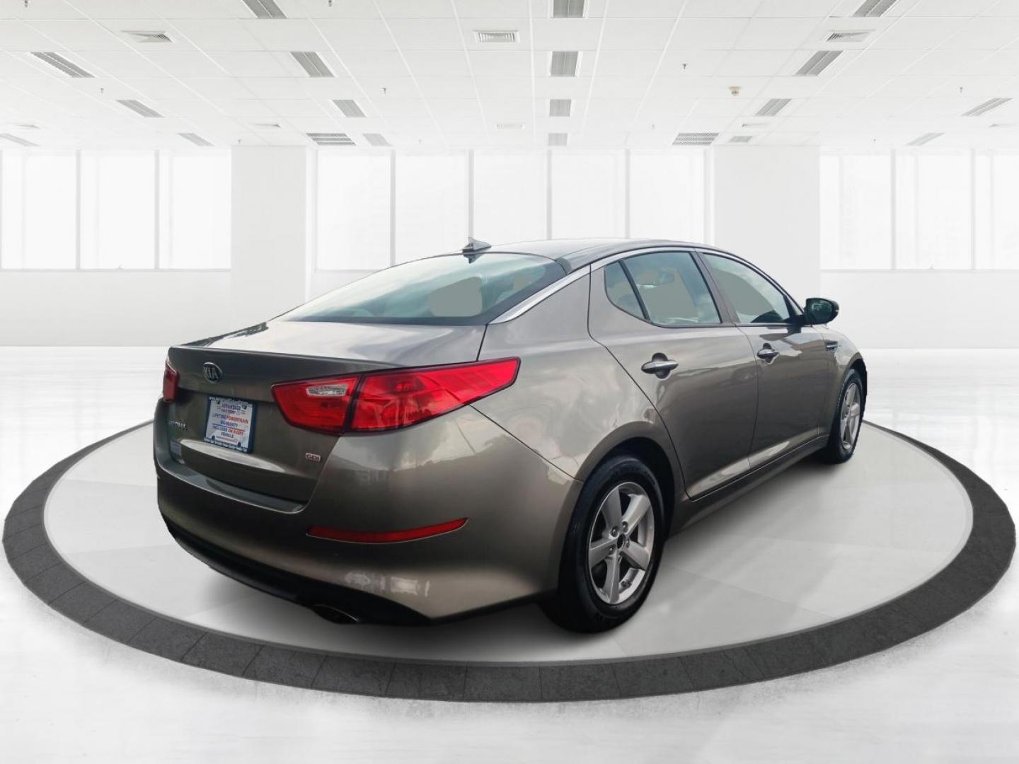 2015 Satin Metal Kia Optima (5XXGM4A77FG) with an 2.4L L4 DOHC 16V engine, 6-Speed Automatic transmission, located at 401 Woodman Dr, Riverside, OH, 45431, (937) 908-9800, 39.763779, -84.122063 - Photo#2