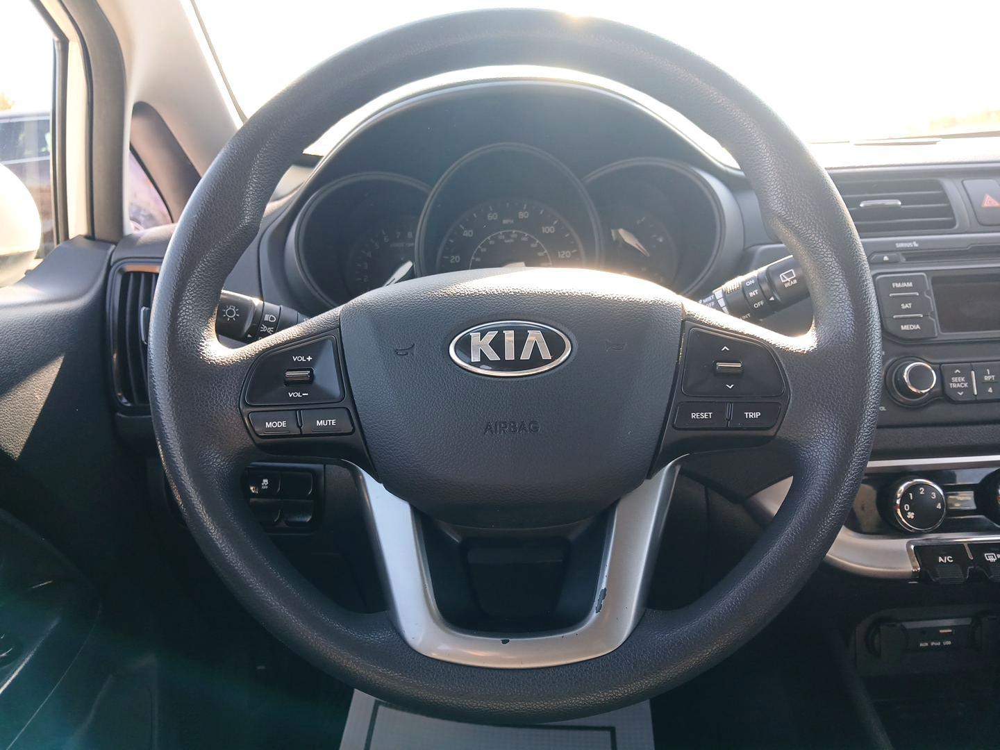 2015 Clear White Kia Rio5 LX 6A (KNADM5A39F6) with an 1.6L L4 DOHC 16V engine, 6-Speed Automatic transmission, located at 1230 East Main St, Xenia, OH, 45385, (937) 908-9800, 39.687321, -83.910294 - Photo#11