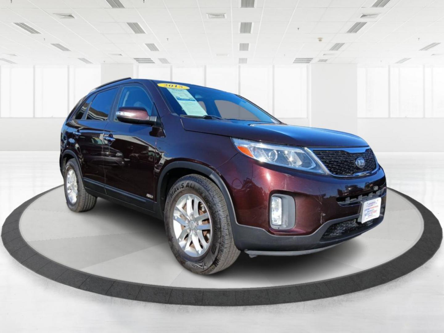 2015 Dark Cherry Kia Sorento LX AWD (5XYKTCA68FG) with an 2.4L L4 DOHC 16V engine, 6-Speed Automatic transmission, located at 1230 East Main St, Xenia, OH, 45385, (937) 908-9800, 39.687321, -83.910294 - Photo#0