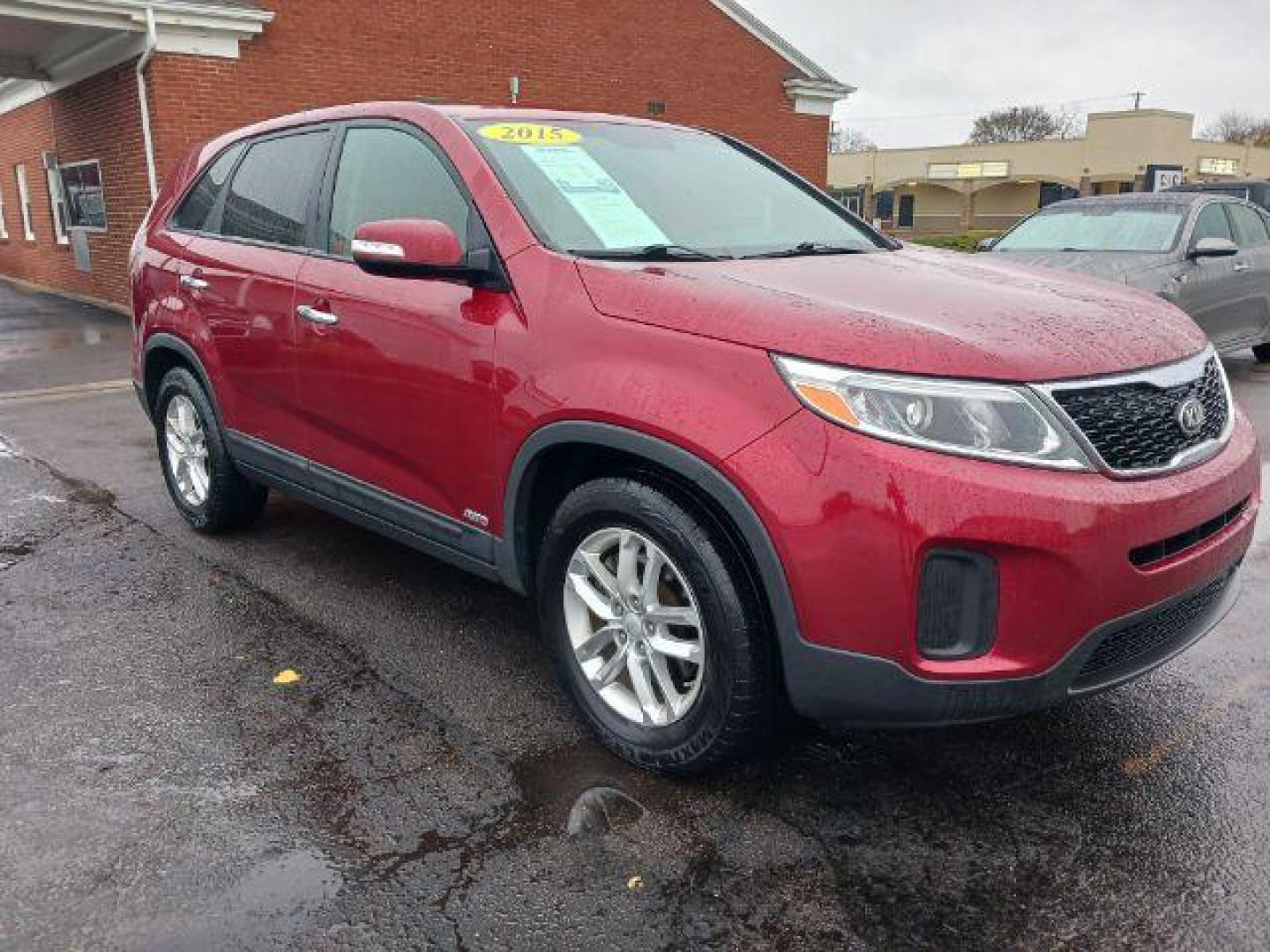 2015 Remington Red Metallic Kia Sorento LX AWD (5XYKTCA66FG) with an 2.4L L4 DOHC 16V engine, 6-Speed Automatic transmission, located at 1230 East Main St, Xenia, OH, 45385, (937) 908-9800, 39.687321, -83.910294 - Photo#0