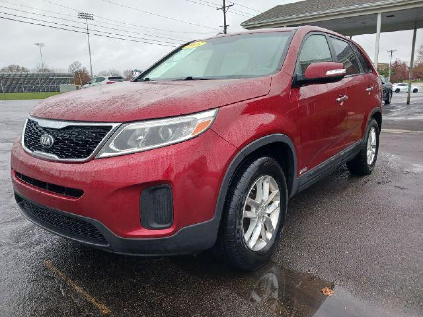 2015 Remington Red Metallic Kia Sorento LX AWD (5XYKTCA66FG) with an 2.4L L4 DOHC 16V engine, 6-Speed Automatic transmission, located at 1230 East Main St, Xenia, OH, 45385, (937) 908-9800, 39.687321, -83.910294 - Photo#2