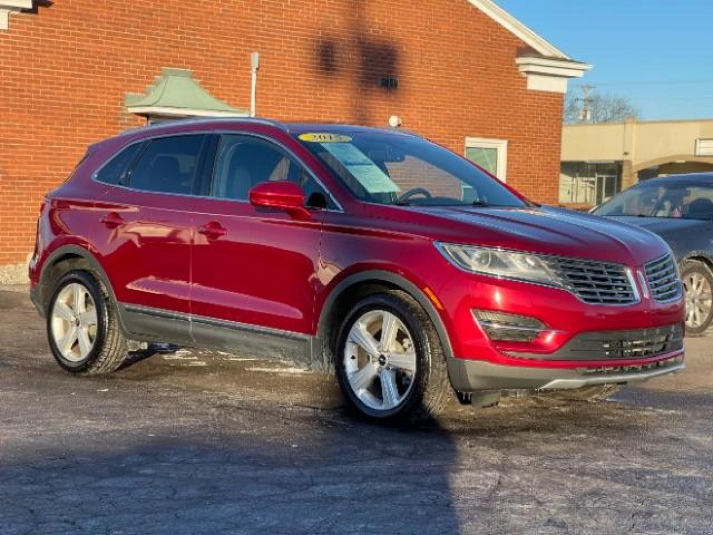 2015 Ruby Red Met Tinted CC Lincoln MKC AWD (5LMCJ2A94FU) with an 2.0L L4 DOHC 16V engine, 6-Speed Automatic transmission, located at 4508 South Dixie Dr, Moraine, OH, 45439, (937) 908-9800, 39.690136, -84.216438 - Photo#0