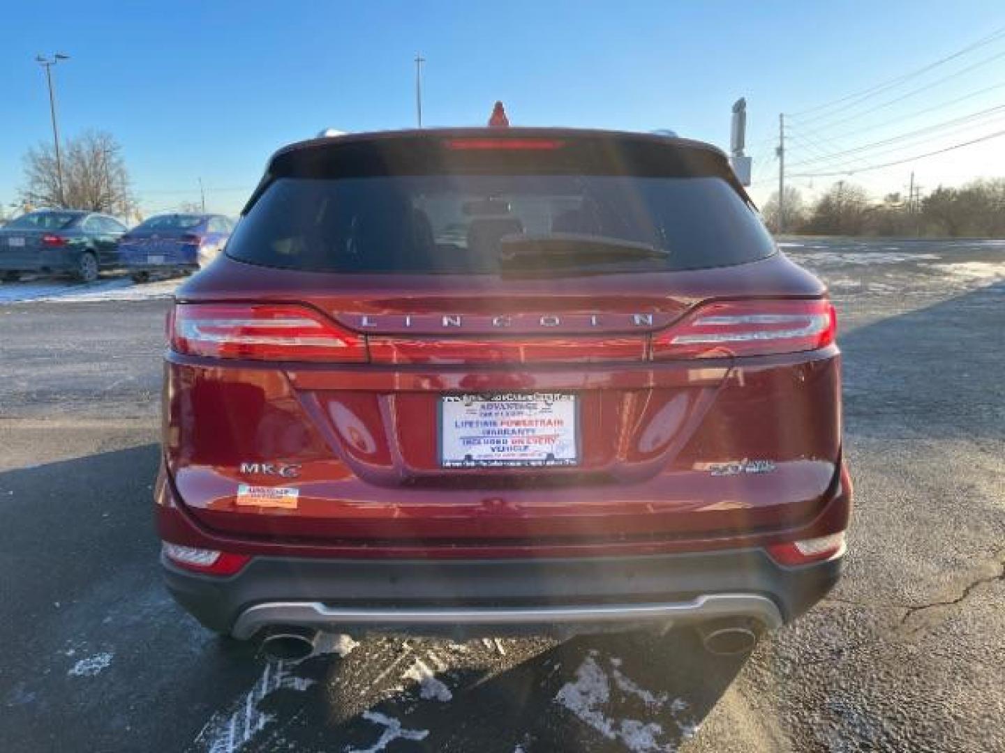 2015 Ruby Red Met Tinted CC Lincoln MKC AWD (5LMCJ2A94FU) with an 2.0L L4 DOHC 16V engine, 6-Speed Automatic transmission, located at 4508 South Dixie Dr, Moraine, OH, 45439, (937) 908-9800, 39.690136, -84.216438 - Photo#2