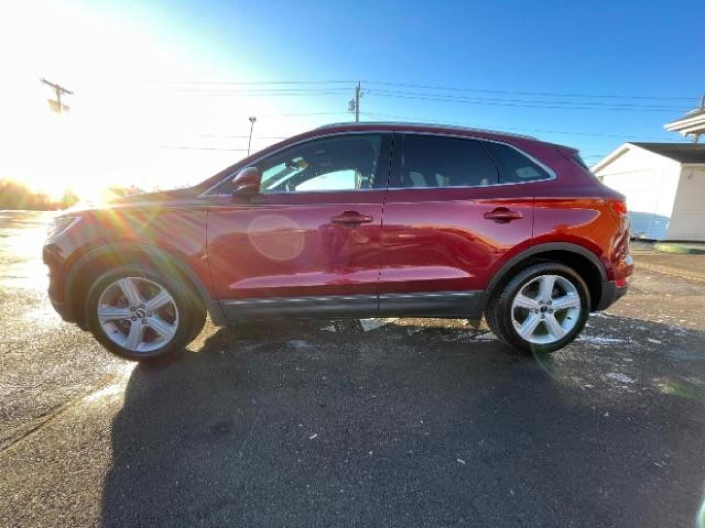 2015 Ruby Red Met Tinted CC Lincoln MKC AWD (5LMCJ2A94FU) with an 2.0L L4 DOHC 16V engine, 6-Speed Automatic transmission, located at 4508 South Dixie Dr, Moraine, OH, 45439, (937) 908-9800, 39.690136, -84.216438 - Photo#4