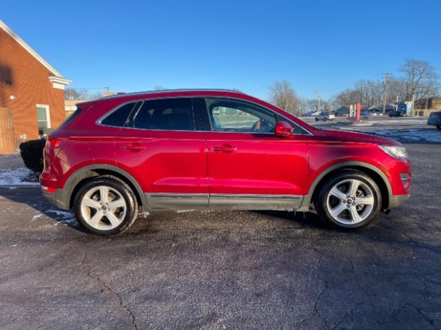 2015 Ruby Red Met Tinted CC Lincoln MKC AWD (5LMCJ2A94FU) with an 2.0L L4 DOHC 16V engine, 6-Speed Automatic transmission, located at 4508 South Dixie Dr, Moraine, OH, 45439, (937) 908-9800, 39.690136, -84.216438 - Photo#5