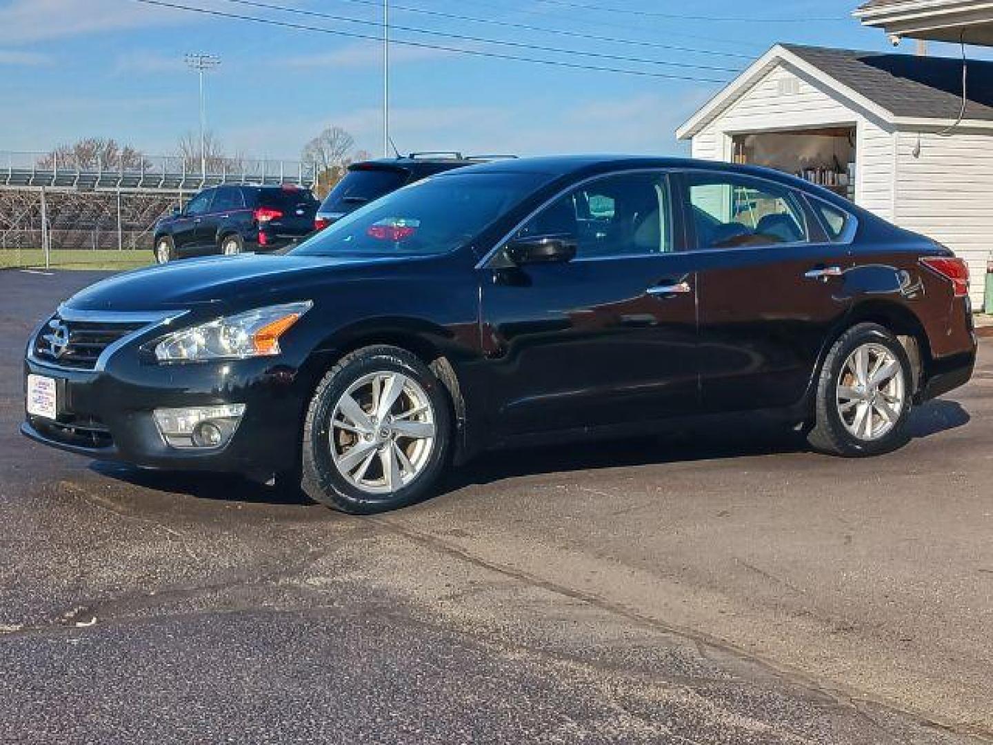 2015 Super Black Nissan Altima 2.5 SV (1N4AL3APXFC) with an 2.5L L4 DOHC 16V engine, Continuously Variable Transmission transmission, located at 401 Woodman Dr, Riverside, OH, 45431, (937) 908-9800, 39.763779, -84.122063 - Photo#2