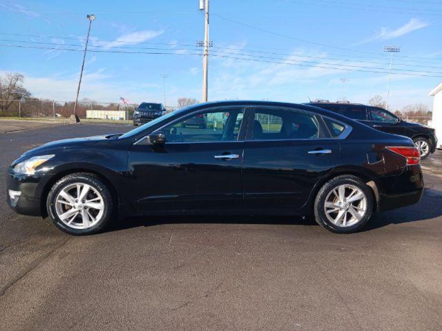 2015 Super Black Nissan Altima 2.5 SV (1N4AL3APXFC) with an 2.5L L4 DOHC 16V engine, Continuously Variable Transmission transmission, located at 401 Woodman Dr, Riverside, OH, 45431, (937) 908-9800, 39.763779, -84.122063 - Photo#3