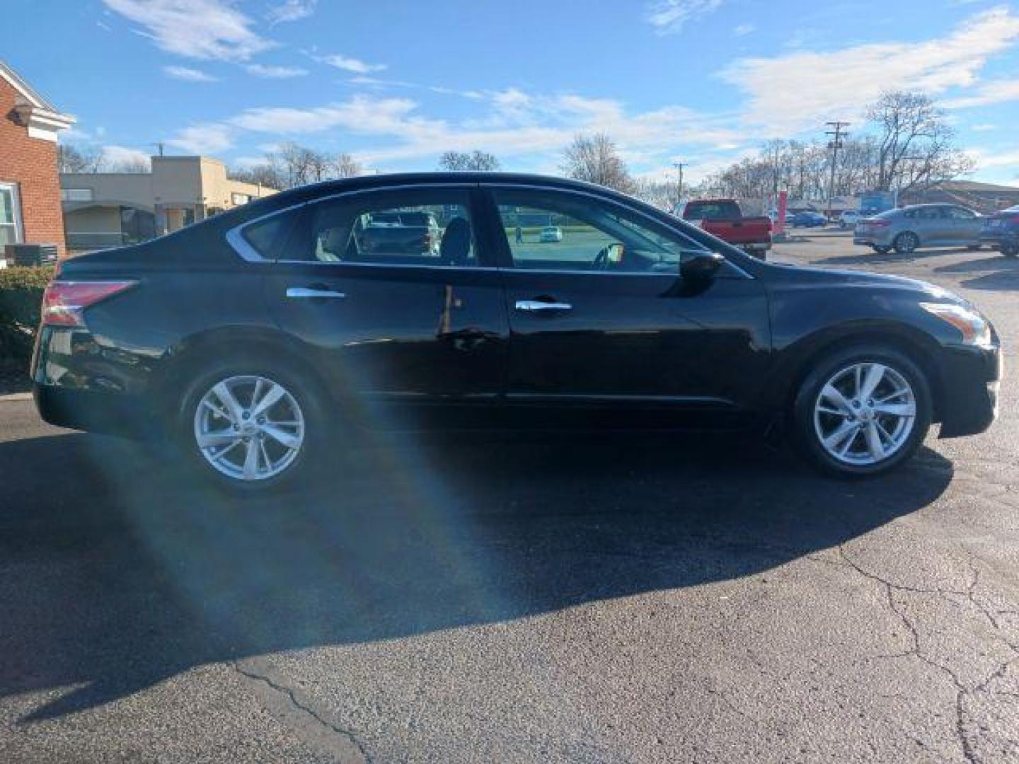 2015 Super Black Nissan Altima 2.5 SV (1N4AL3APXFC) with an 2.5L L4 DOHC 16V engine, Continuously Variable Transmission transmission, located at 401 Woodman Dr, Riverside, OH, 45431, (937) 908-9800, 39.763779, -84.122063 - Photo#4