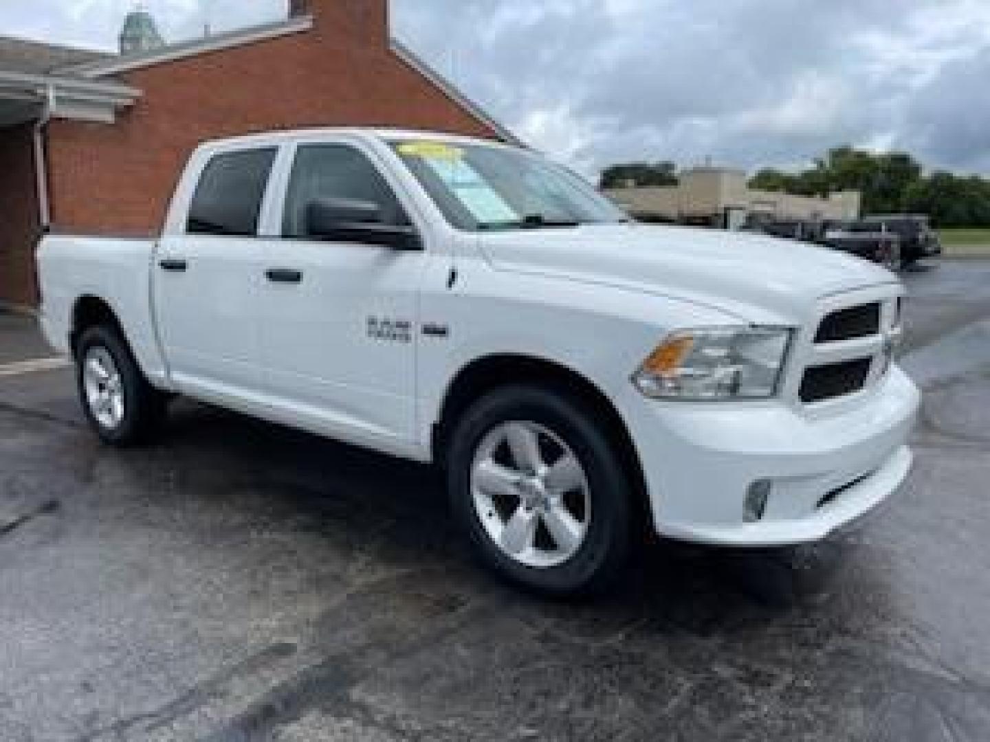 2015 White RAM 1500 Tradesman Crew Cab SWB 4WD (3C6RR7KT5FG) with an 5.7L V8 OHV 16V engine, 8-Speed Automatic transmission, located at 1184 Kauffman Ave, Fairborn, OH, 45324, (937) 908-9800, 39.807365, -84.029114 - Photo#0