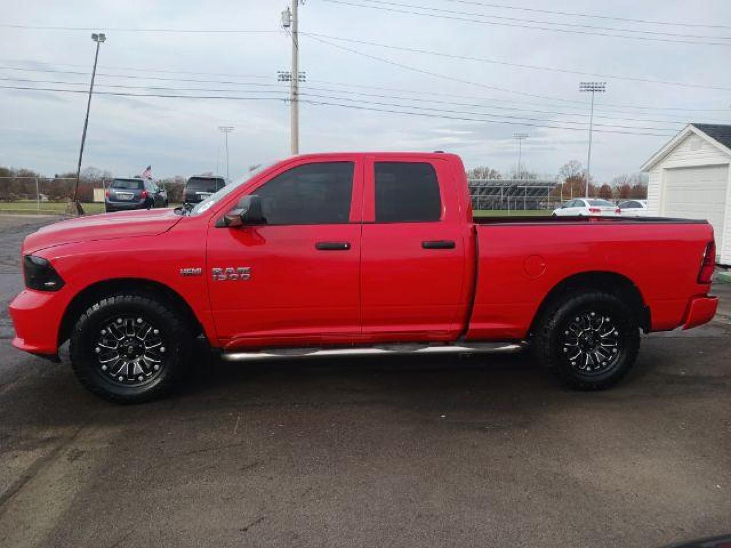 2015 Red RAM 1500 Tradesman Quad Cab 4WD (1C6RR7FT3FS) with an 5.7L V8 OHV 16V engine, 8-Speed Automatic transmission, located at 1951 S Dayton Lakeview Rd., New Carlisle, OH, 45344, (937) 908-9800, 39.890999, -84.050255 - Photo#3