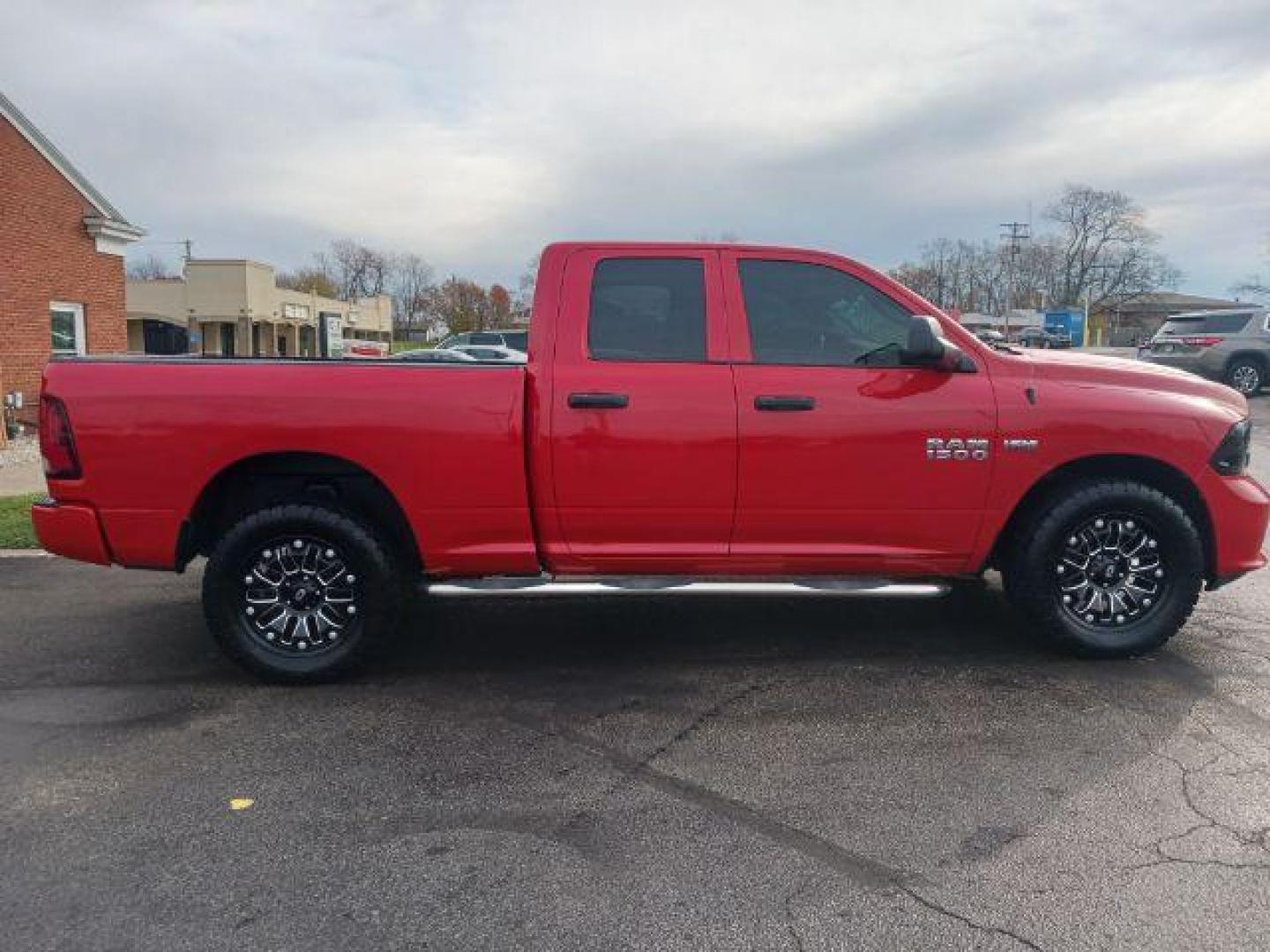 2015 Red RAM 1500 Tradesman Quad Cab 4WD (1C6RR7FT3FS) with an 5.7L V8 OHV 16V engine, 8-Speed Automatic transmission, located at 1951 S Dayton Lakeview Rd., New Carlisle, OH, 45344, (937) 908-9800, 39.890999, -84.050255 - Photo#4