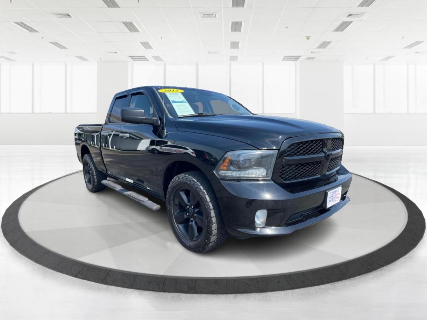 2015 Black RAM 1500 Tradesman Quad Cab 4WD (1C6RR7FTXFS) with an 5.7L V8 OHV 16V engine, 6-Speed Automatic transmission, located at 1951 S Dayton Lakeview Rd., New Carlisle, OH, 45344, (937) 908-9800, 39.890999, -84.050255 - Photo#0