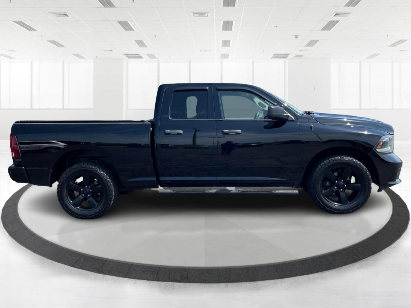 2015 Black RAM 1500 Tradesman Quad Cab 4WD (1C6RR7FTXFS) with an 5.7L V8 OHV 16V engine, 6-Speed Automatic transmission, located at 1951 S Dayton Lakeview Rd., New Carlisle, OH, 45344, (937) 908-9800, 39.890999, -84.050255 - Photo#1