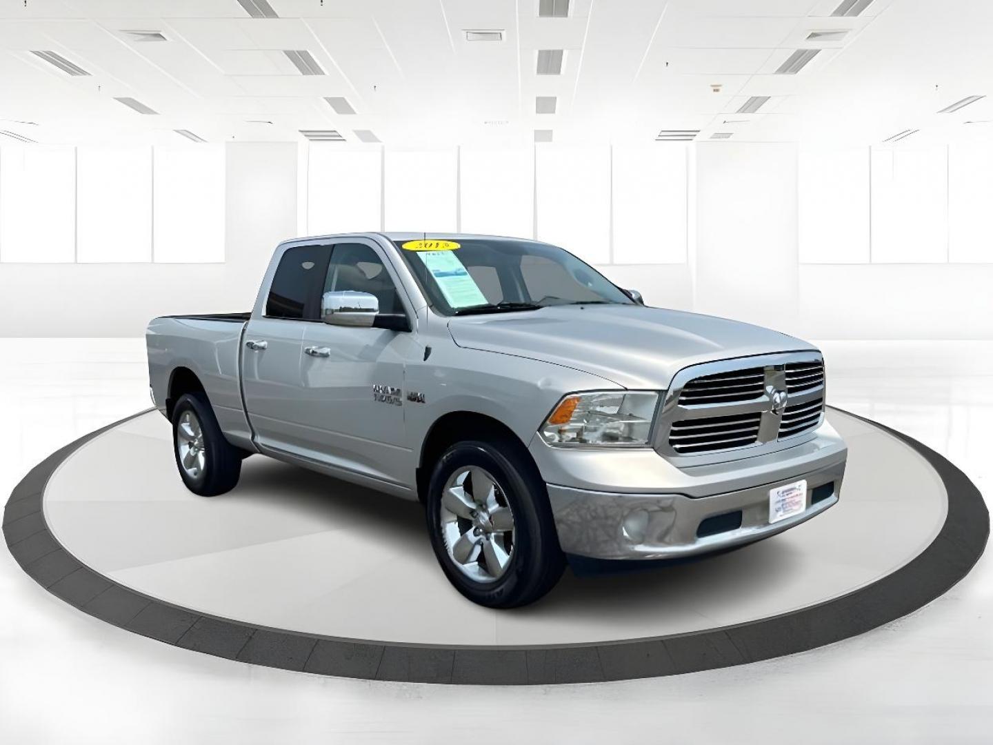 2015 Silver RAM 1500 SLT Quad Cab 4WD (1C6RR7GT6FS) with an 5.7L V8 OHV 16V engine, 8-Speed Automatic transmission, located at 1099 N County Rd 25A, OH, 45373, (937) 908-9800, 40.057079, -84.212883 - Photo#0