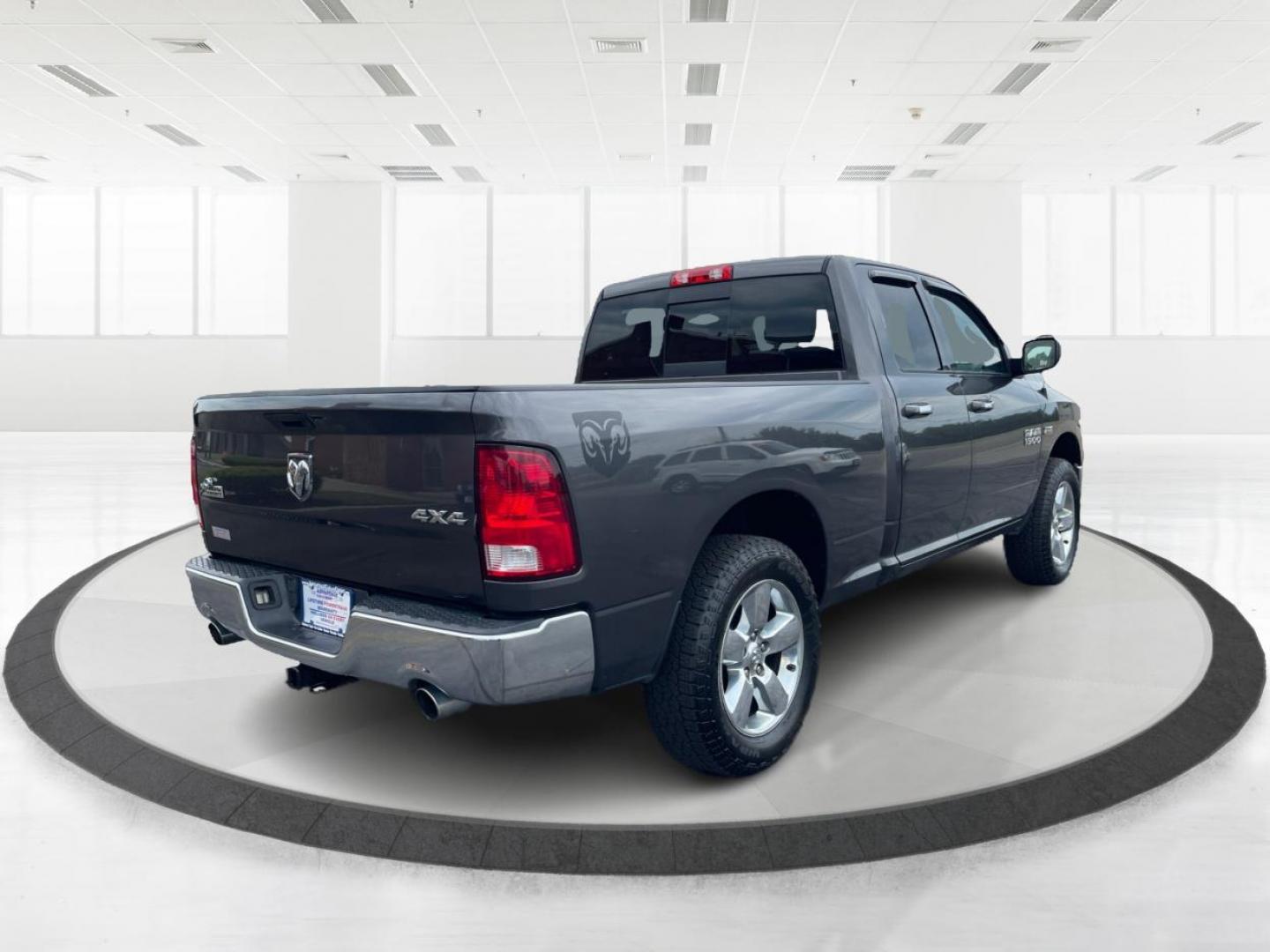 2015 Gray RAM 1500 SLT Quad Cab 4WD (1C6RR7GT3FS) with an 5.7L V8 OHV 16V engine, 8-Speed Automatic transmission, located at 1099 N County Rd 25A, OH, 45373, (937) 908-9800, 40.057079, -84.212883 - Photo#2