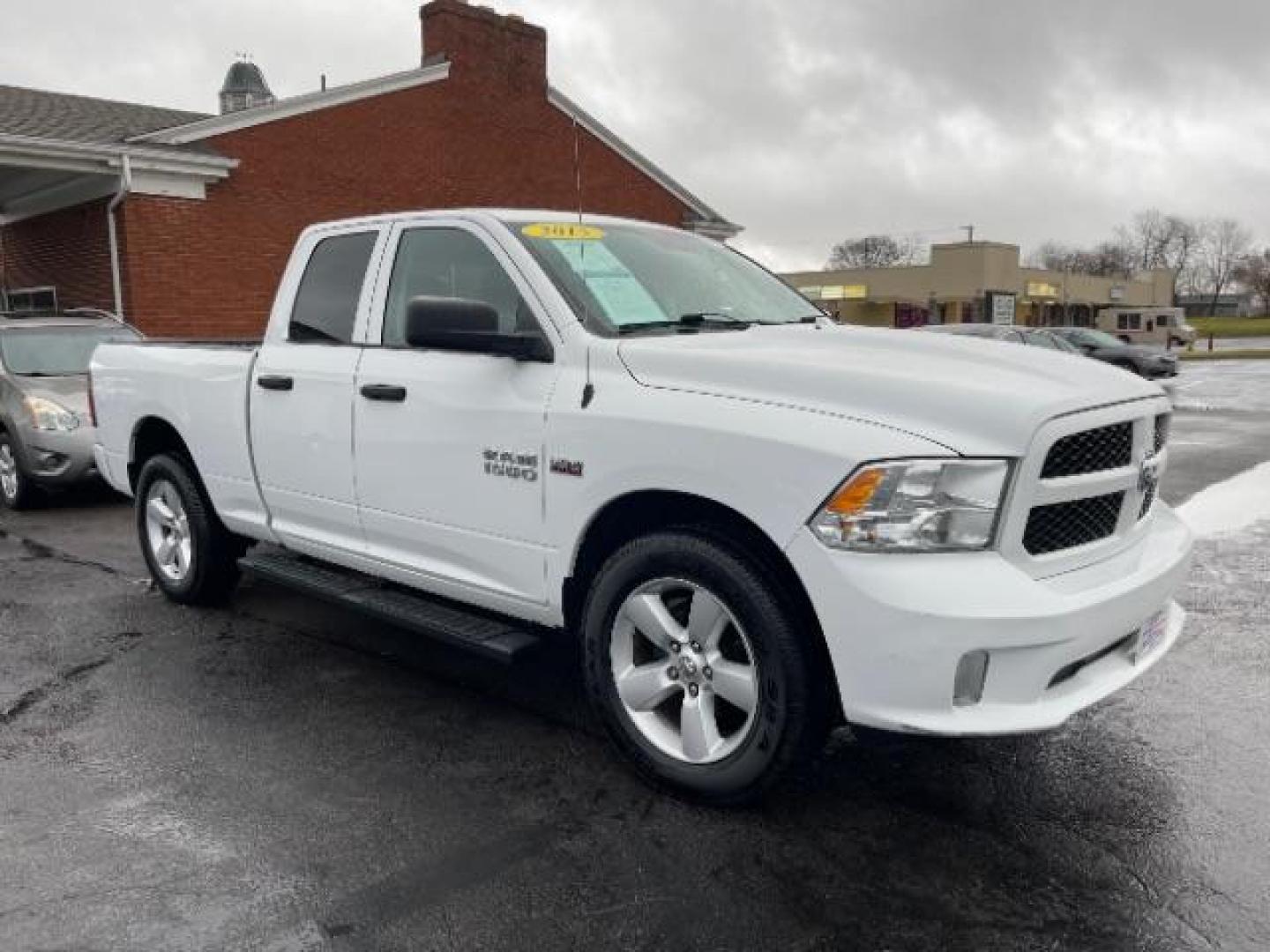 2015 White RAM 1500 Tradesman Quad Cab 4WD (1C6RR7FTXFS) with an 5.7L V8 OHV 16V engine, 8-Speed Automatic transmission, located at 1951 S Dayton Lakeview Rd., New Carlisle, OH, 45344, (937) 908-9800, 39.890999, -84.050255 - Photo#0