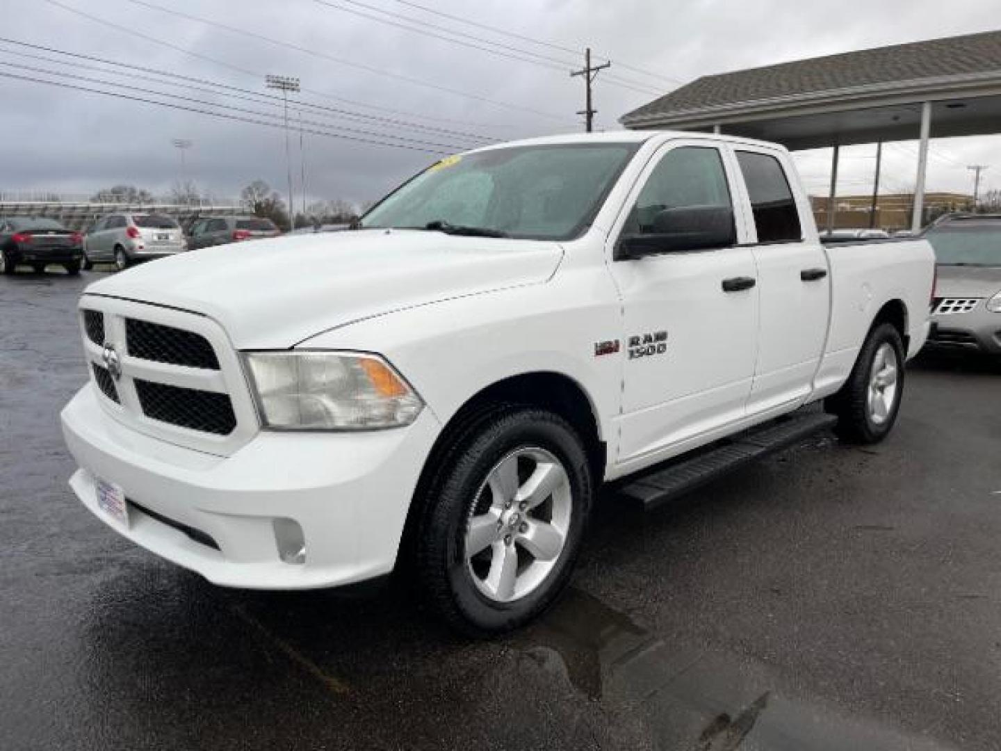 2015 White RAM 1500 Tradesman Quad Cab 4WD (1C6RR7FTXFS) with an 5.7L V8 OHV 16V engine, 8-Speed Automatic transmission, located at 1951 S Dayton Lakeview Rd., New Carlisle, OH, 45344, (937) 908-9800, 39.890999, -84.050255 - Photo#1