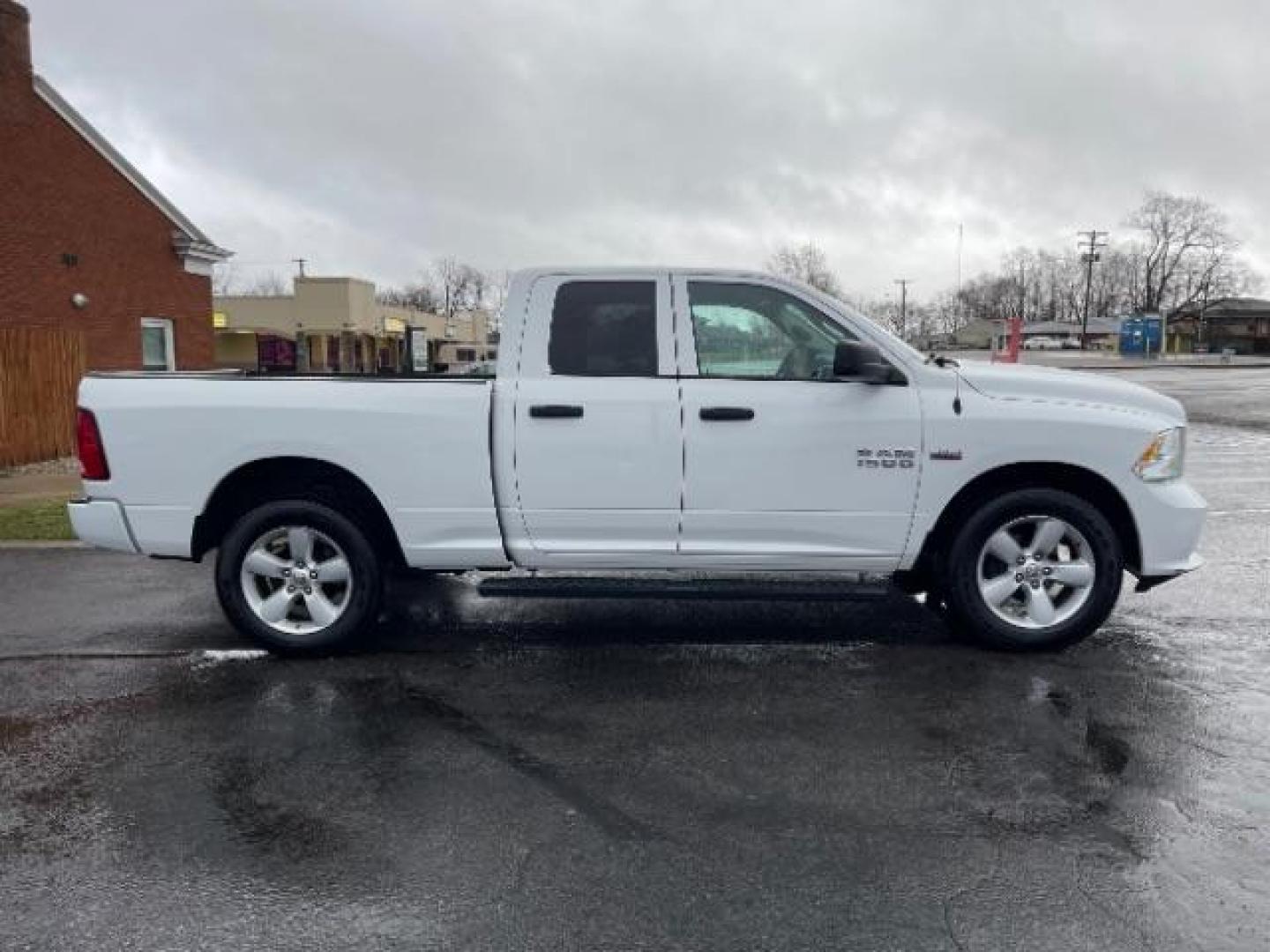 2015 White RAM 1500 Tradesman Quad Cab 4WD (1C6RR7FTXFS) with an 5.7L V8 OHV 16V engine, 8-Speed Automatic transmission, located at 1951 S Dayton Lakeview Rd., New Carlisle, OH, 45344, (937) 908-9800, 39.890999, -84.050255 - Photo#5