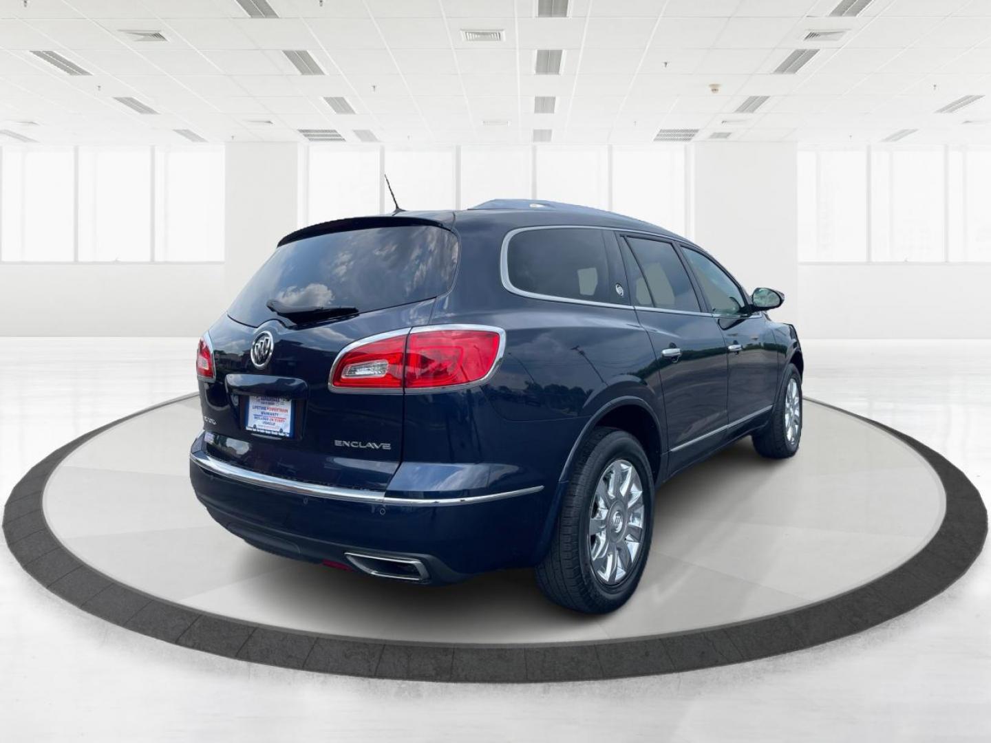 2016 Dark Sapphire Blue Metallic Buick Enclave Leather FWD (5GAKRBKD1GJ) with an 3.6L V6 DOHC 24V engine, 6-Speed Automatic Overdrive transmission, located at 1099 N County Rd 25A, OH, 45373, (937) 908-9800, 40.057079, -84.212883 - Photo#2