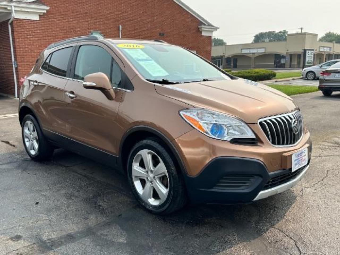 2016 River Rock Metallic/Dark Cocoa Ash Buick Encore Base FWD (KL4CJASB3GB) with an 1.4L L4 DOHC 16V TURBO engine, 6-Speed Automatic transmission, located at 401 Woodman Dr, Riverside, OH, 45431, (937) 908-9800, 39.763779, -84.122063 - Photo#0