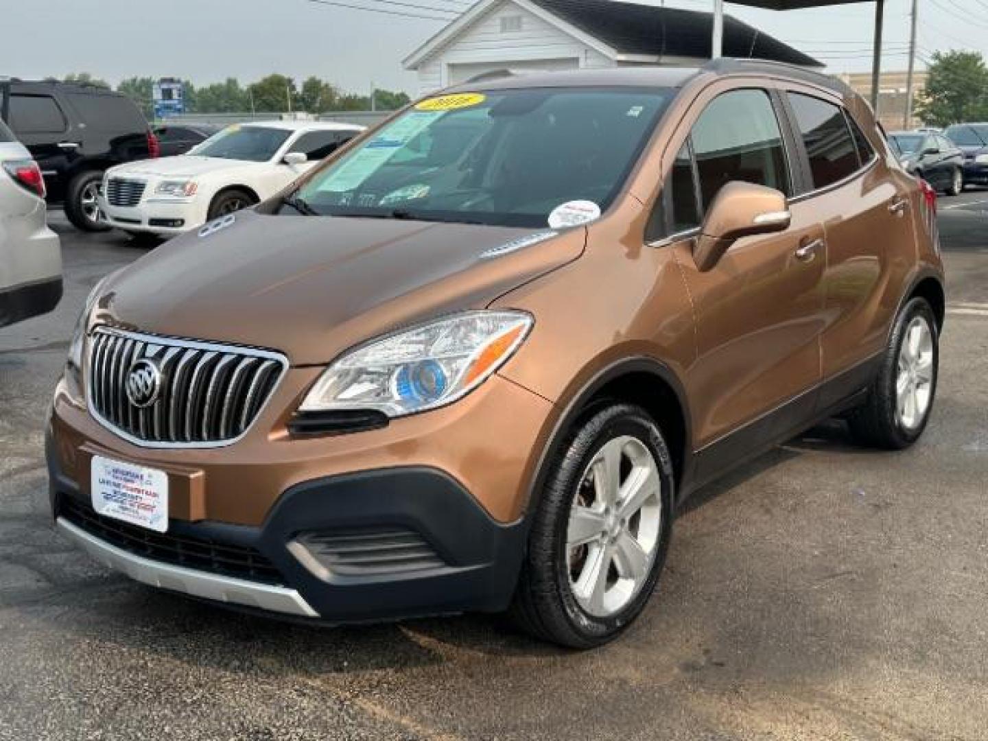 2016 River Rock Metallic/Dark Cocoa Ash Buick Encore Base FWD (KL4CJASB3GB) with an 1.4L L4 DOHC 16V TURBO engine, 6-Speed Automatic transmission, located at 401 Woodman Dr, Riverside, OH, 45431, (937) 908-9800, 39.763779, -84.122063 - Photo#2