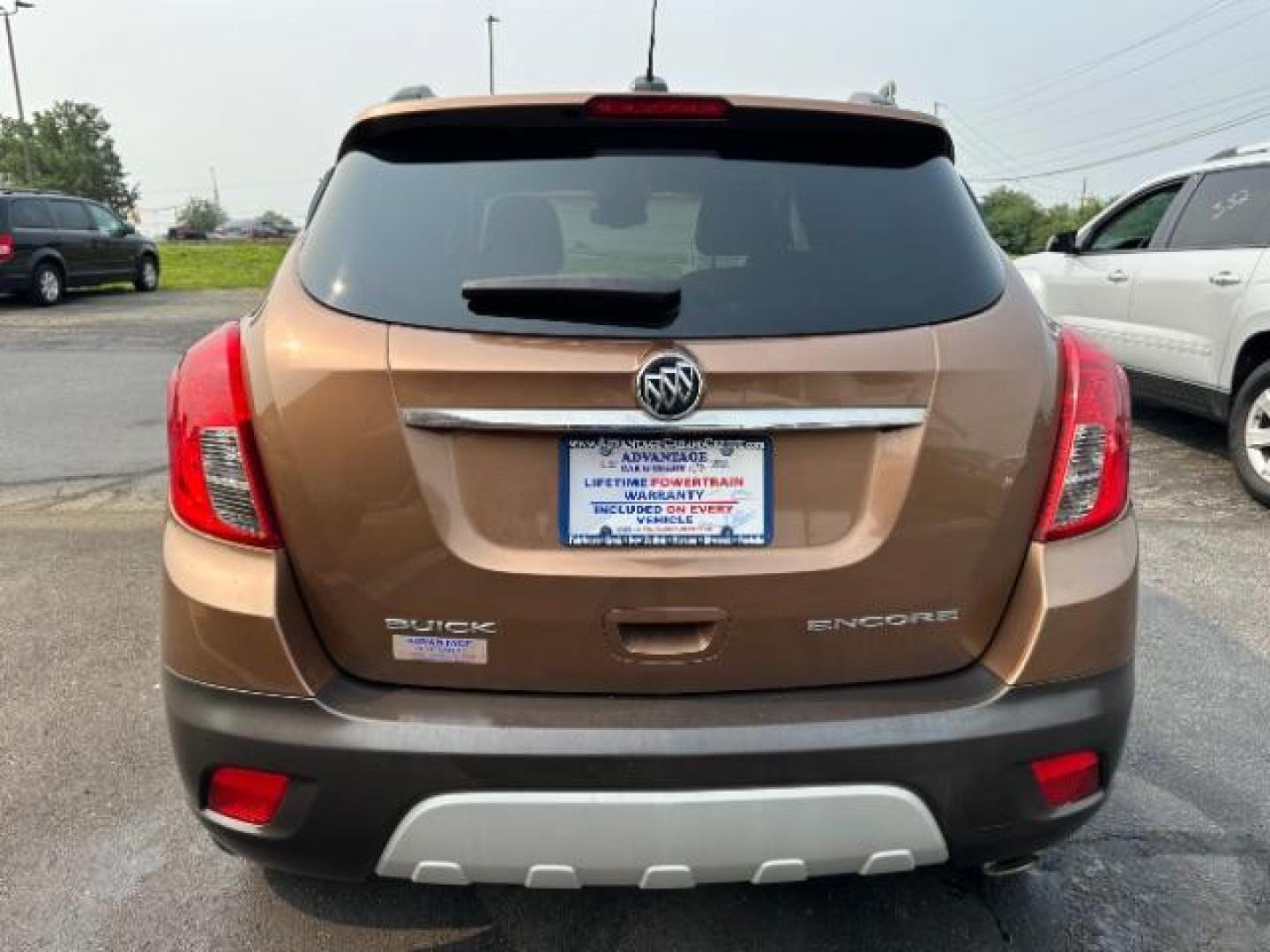 2016 River Rock Metallic/Dark Cocoa Ash Buick Encore Base FWD (KL4CJASB3GB) with an 1.4L L4 DOHC 16V TURBO engine, 6-Speed Automatic transmission, located at 401 Woodman Dr, Riverside, OH, 45431, (937) 908-9800, 39.763779, -84.122063 - Photo#3