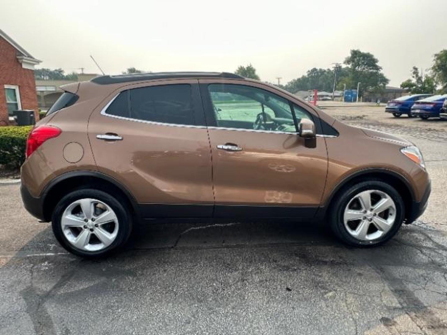 2016 River Rock Metallic/Dark Cocoa Ash Buick Encore Base FWD (KL4CJASB3GB) with an 1.4L L4 DOHC 16V TURBO engine, 6-Speed Automatic transmission, located at 401 Woodman Dr, Riverside, OH, 45431, (937) 908-9800, 39.763779, -84.122063 - Photo#4