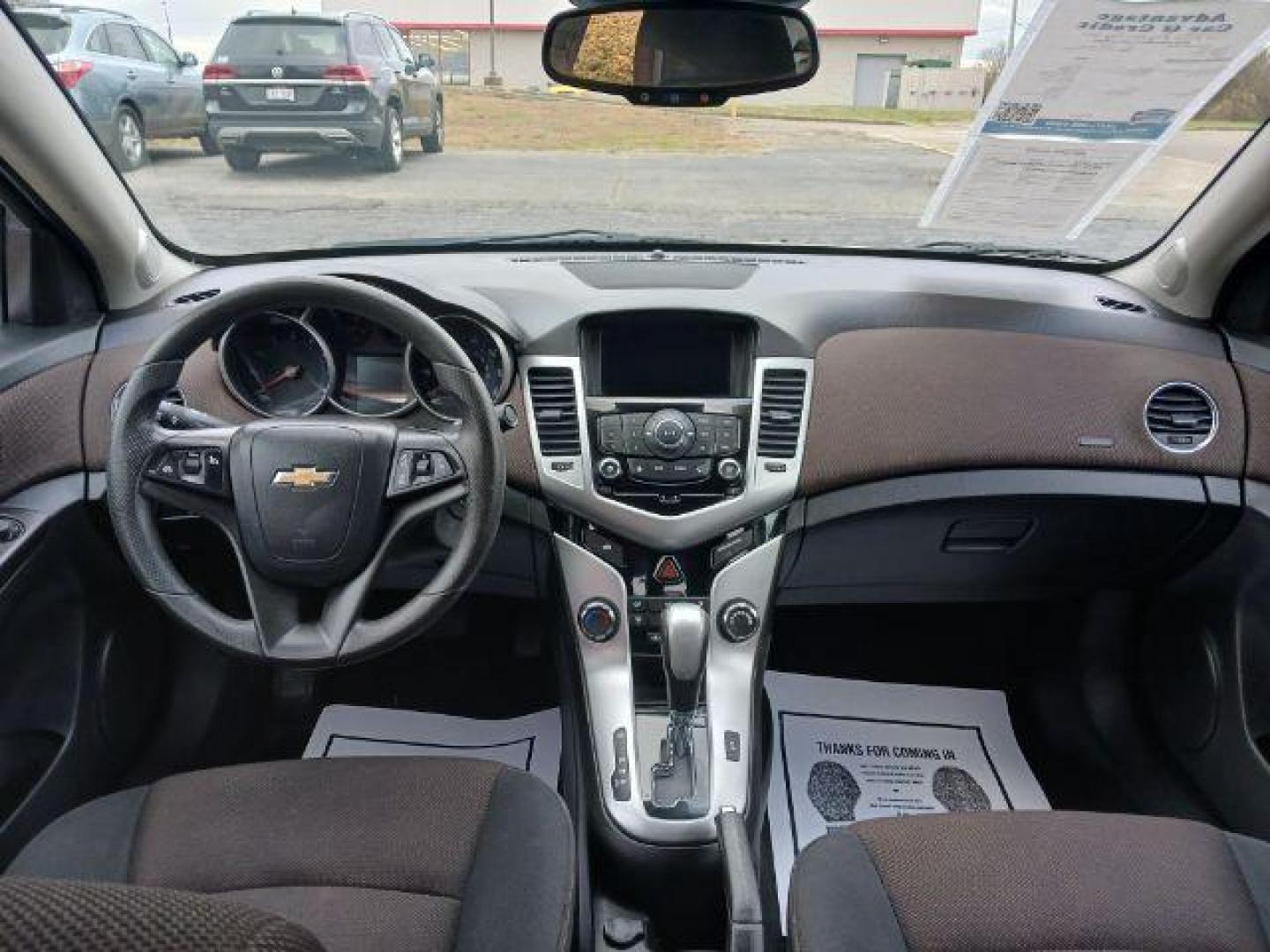 2016 Gold Chevrolet Cruze Limited 1LT Auto (1G1PE5SB0G7) with an 1.4L L4 DOHC 16V TURBO engine, 6-Speed Automatic transmission, located at 1099 N County Rd 25A, OH, 45373, (937) 908-9800, 40.057079, -84.212883 - Photo#7