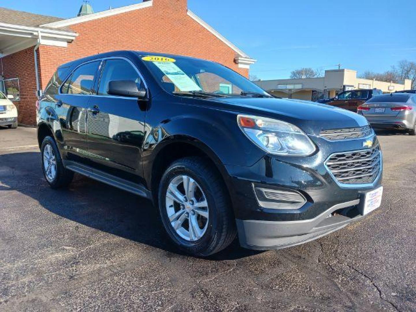 2016 Black Chevrolet Equinox LS 2WD (2GNALBEK0G6) with an 2.4L L4 DOHC 16V FFV engine, 6-Speed Automatic transmission, located at 401 Woodman Dr, Riverside, OH, 45431, (937) 908-9800, 39.763779, -84.122063 - Photo#0