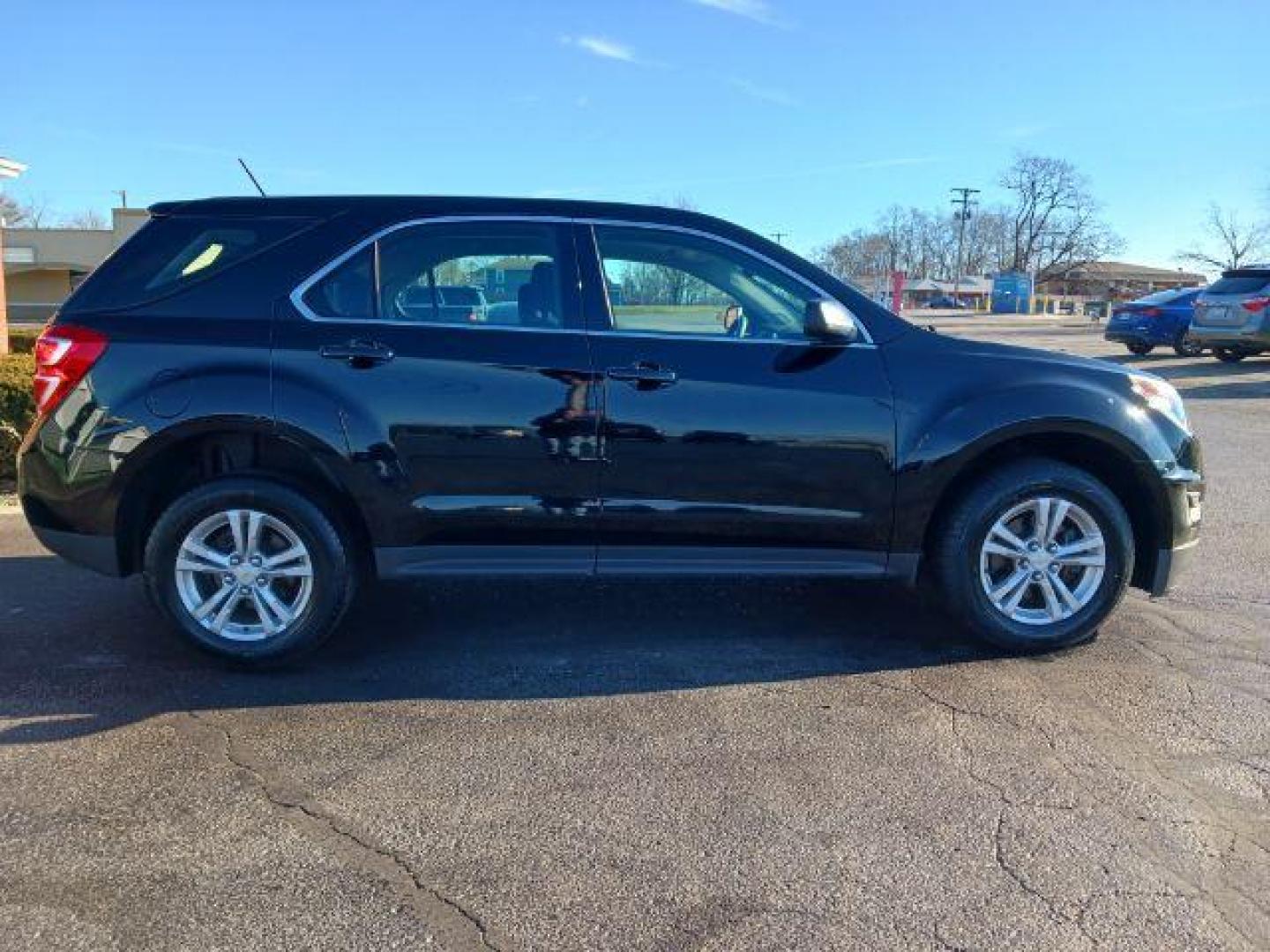 2016 Black Chevrolet Equinox LS 2WD (2GNALBEK0G6) with an 2.4L L4 DOHC 16V FFV engine, 6-Speed Automatic transmission, located at 401 Woodman Dr, Riverside, OH, 45431, (937) 908-9800, 39.763779, -84.122063 - Photo#4