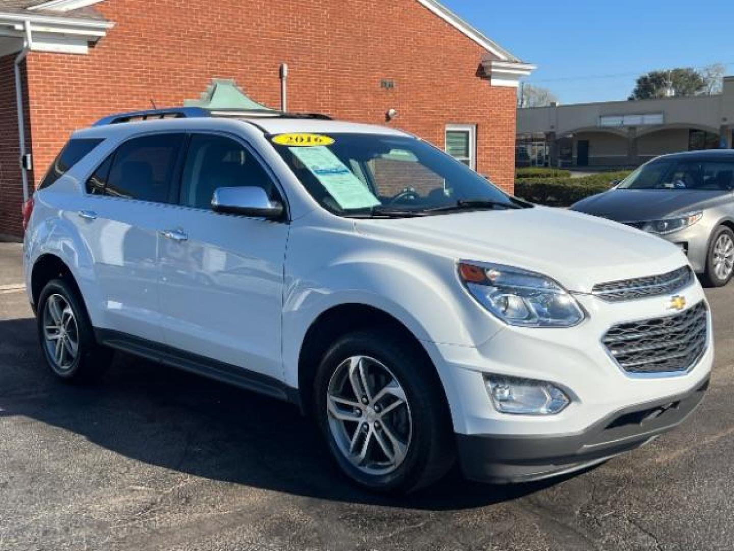 2016 Summit White Chevrolet Equinox LTZ 2WD (1GNALDEK4GZ) with an 2.4L L4 DOHC 16V FFV engine, 6-Speed Automatic transmission, located at 1099 N County Rd 25A, OH, 45373, (937) 908-9800, 40.057079, -84.212883 - Photo#0