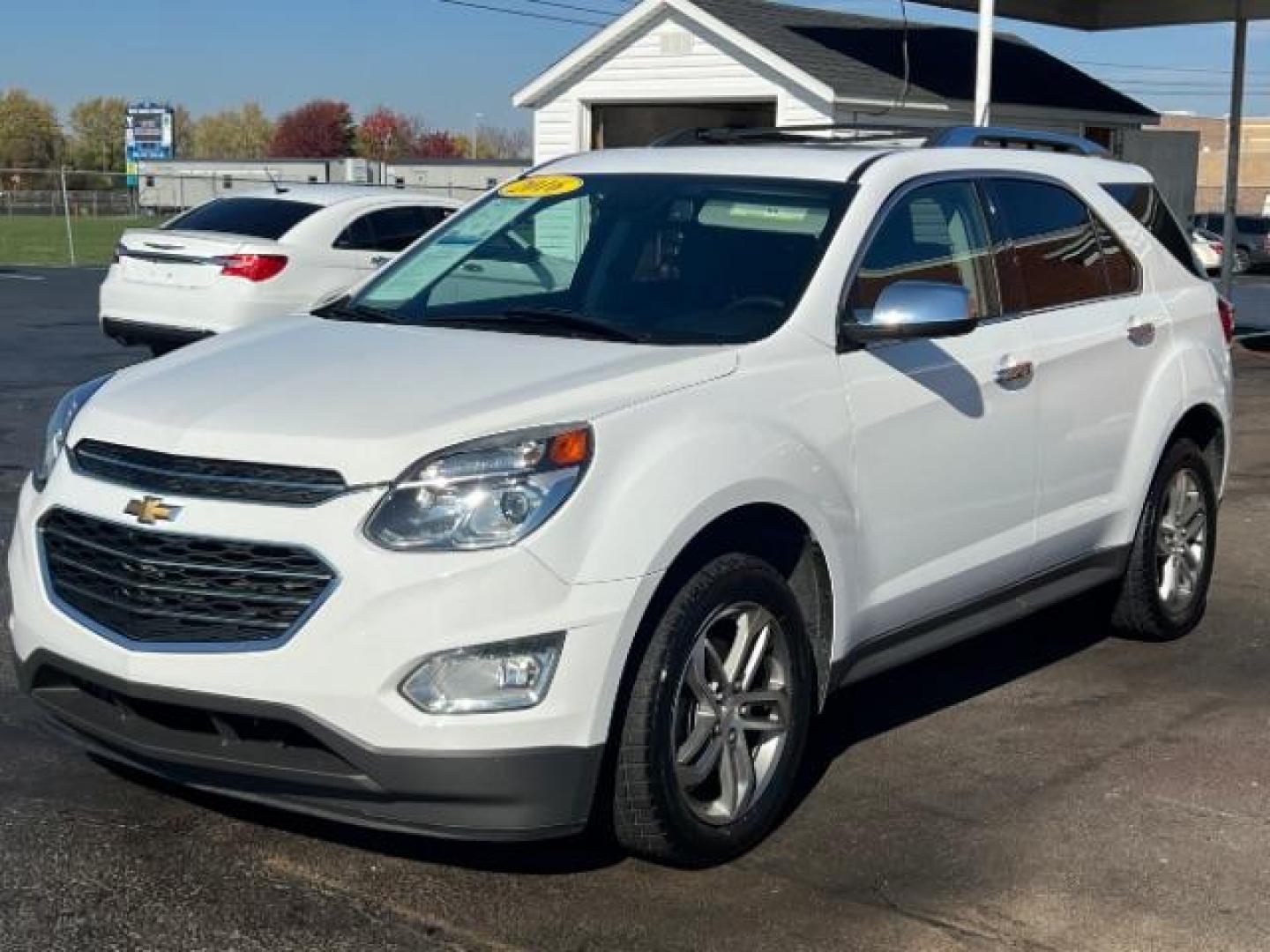 2016 Summit White Chevrolet Equinox LTZ 2WD (1GNALDEK4GZ) with an 2.4L L4 DOHC 16V FFV engine, 6-Speed Automatic transmission, located at 1099 N County Rd 25A, OH, 45373, (937) 908-9800, 40.057079, -84.212883 - Photo#2