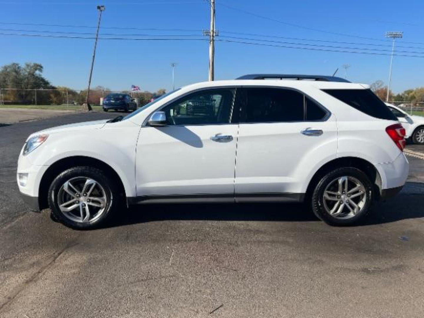 2016 Summit White Chevrolet Equinox LTZ 2WD (1GNALDEK4GZ) with an 2.4L L4 DOHC 16V FFV engine, 6-Speed Automatic transmission, located at 1099 N County Rd 25A, OH, 45373, (937) 908-9800, 40.057079, -84.212883 - Photo#3