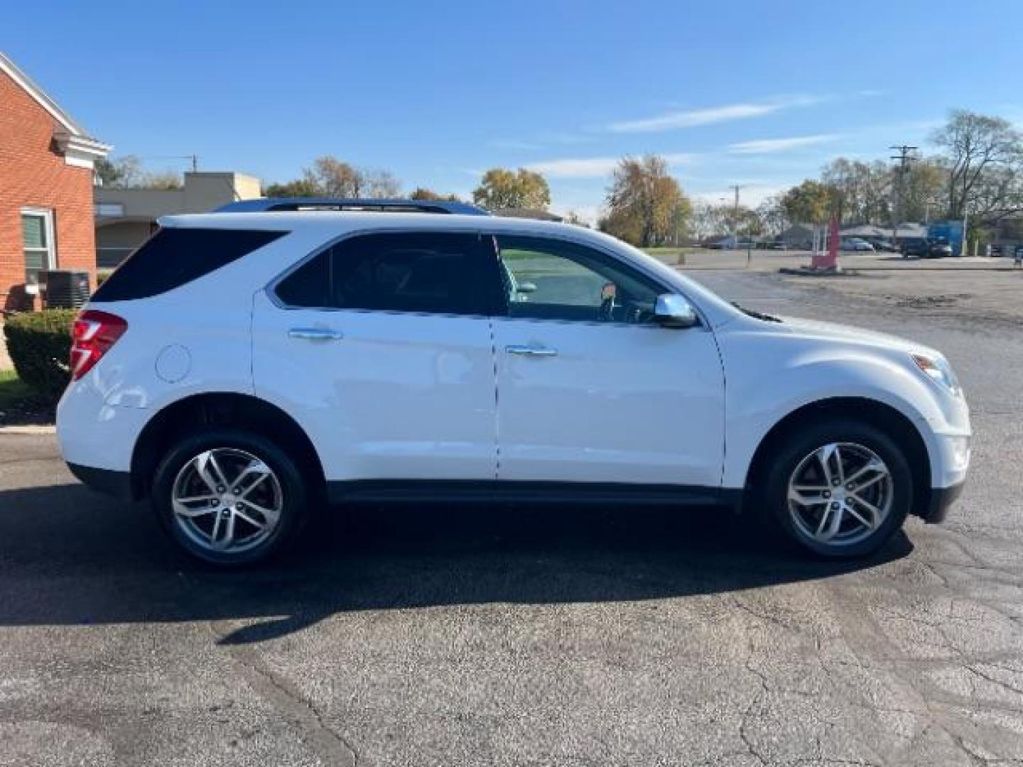 2016 Summit White Chevrolet Equinox LTZ 2WD (1GNALDEK4GZ) with an 2.4L L4 DOHC 16V FFV engine, 6-Speed Automatic transmission, located at 1099 N County Rd 25A, OH, 45373, (937) 908-9800, 40.057079, -84.212883 - Photo#5