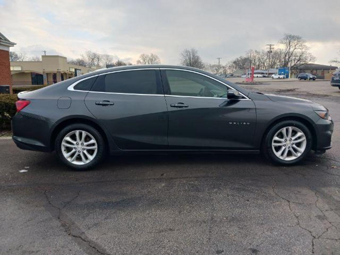 2016 Mosaic Black Metallic Chevrolet Malibu 1LT (1G1ZE5ST7GF) with an 1.5L L4 DOHC 16V engine, 6-Speed Automatic transmission, located at 4508 South Dixie Dr, Moraine, OH, 45439, (937) 908-9800, 39.690136, -84.216438 - Photo#4