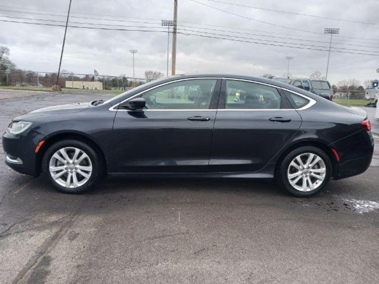 2016 Maximum Steel Metallic Clear Coat Chrysler 200 Limited (1C3CCCABXGN) with an 2.4L L4 DOHC 16V engine, 9-Speed Automatic transmission, located at 880 E. National Road, Vandalia, OH, 45377, (937) 908-9800, 39.892189, -84.181015 - Photo#3