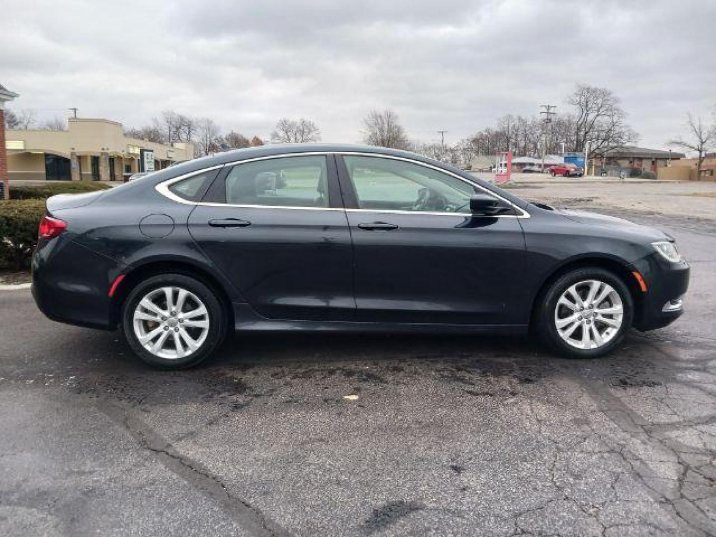 2016 Maximum Steel Metallic Clear Coat Chrysler 200 Limited (1C3CCCABXGN) with an 2.4L L4 DOHC 16V engine, 9-Speed Automatic transmission, located at 880 E. National Road, Vandalia, OH, 45377, (937) 908-9800, 39.892189, -84.181015 - Photo#4