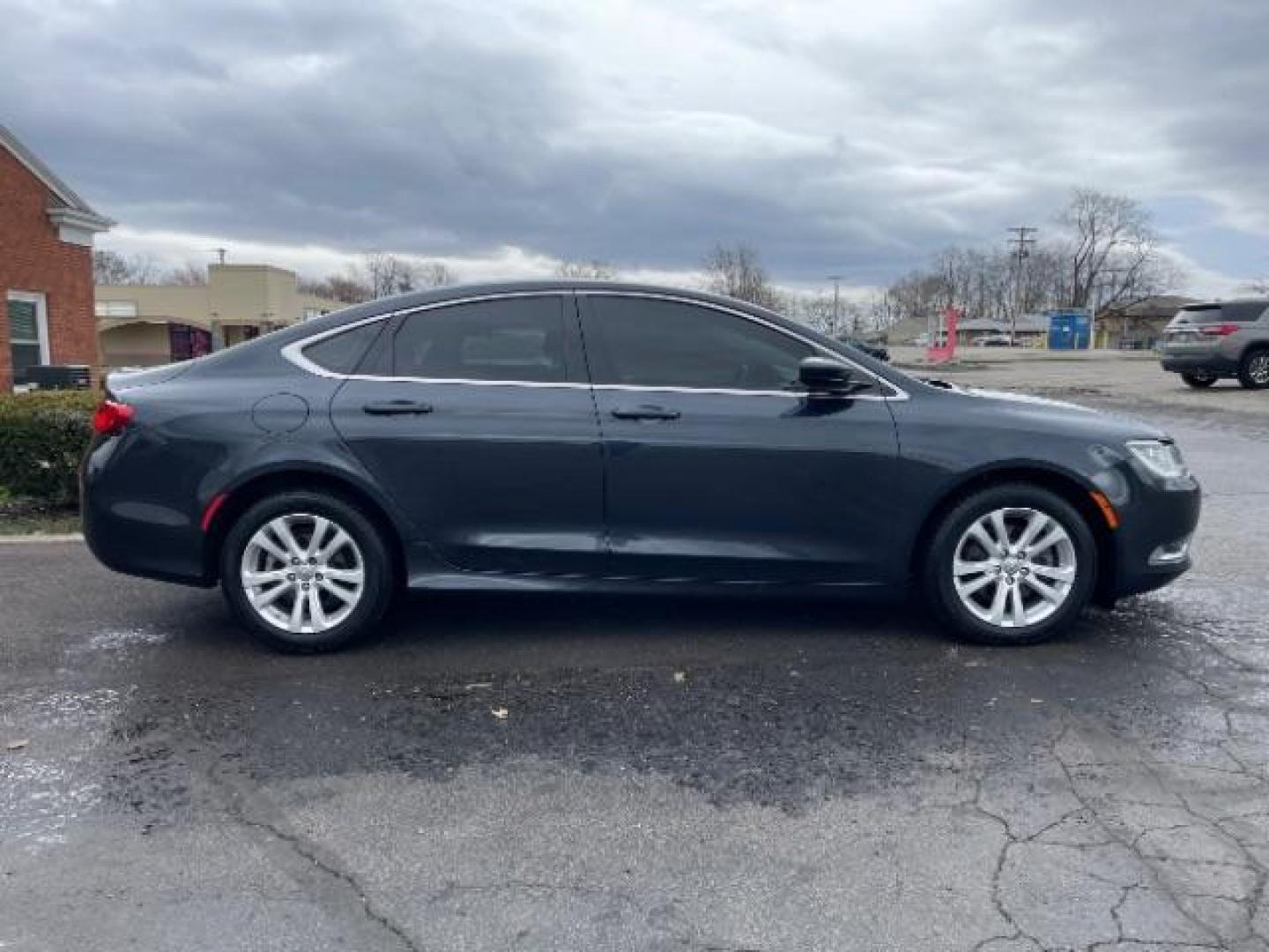 2016 Granite Crystal Metallic Clear Coat Chrysler 200 Limited (1C3CCCAB2GN) with an 2.4L L4 DOHC 16V engine, 9-Speed Automatic transmission, located at 1099 N County Rd 25A, OH, 45373, (937) 908-9800, 40.057079, -84.212883 - Photo#5