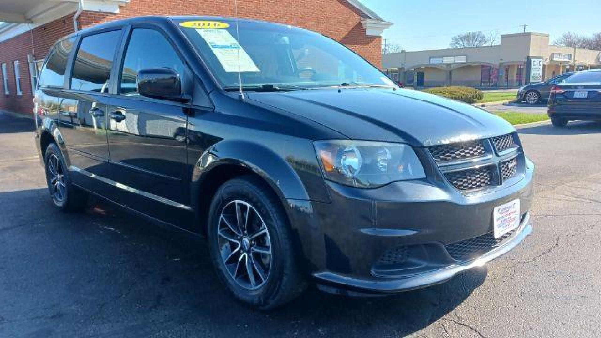 2016 Brilliant Black Crystal Pearl Coat Dodge Grand Caravan SE (2C4RDGBG0GR) with an 3.6L V6 DOHC 24V engine, 6-Speed Automatic transmission, located at 880 E. National Road, Vandalia, OH, 45377, (937) 908-9800, 39.892189, -84.181015 - Photo#0