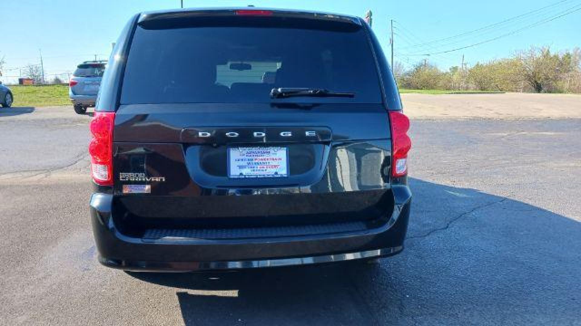 2016 Brilliant Black Crystal Pearl Coat Dodge Grand Caravan SE (2C4RDGBG0GR) with an 3.6L V6 DOHC 24V engine, 6-Speed Automatic transmission, located at 880 E. National Road, Vandalia, OH, 45377, (937) 908-9800, 39.892189, -84.181015 - Photo#5