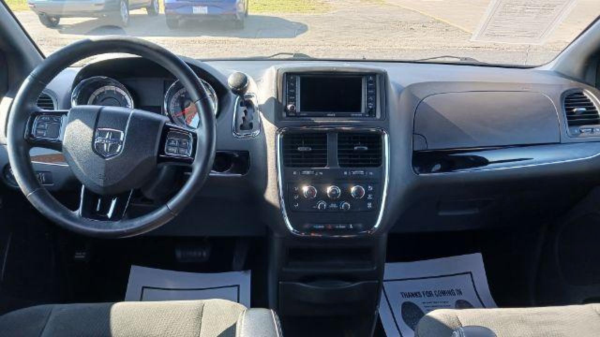 2016 Brilliant Black Crystal Pearl Coat Dodge Grand Caravan SE (2C4RDGBG0GR) with an 3.6L V6 DOHC 24V engine, 6-Speed Automatic transmission, located at 880 E. National Road, Vandalia, OH, 45377, (937) 908-9800, 39.892189, -84.181015 - Photo#7