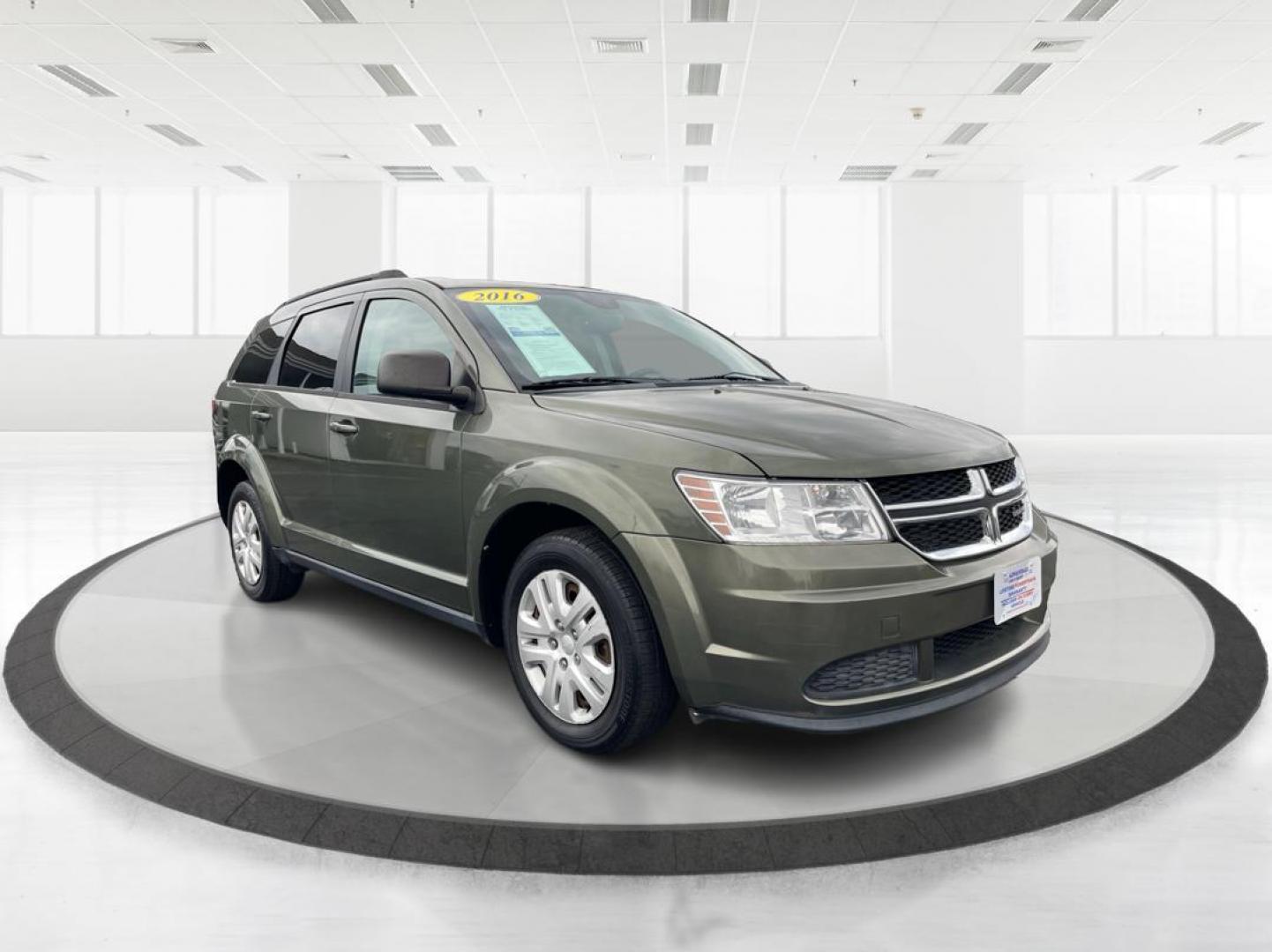 2016 Granite Crystal Metallic Clear Coat Dodge Journey SE (3C4PDCAB6GT) with an 2.4L L4 DOHC 16V engine, 4A transmission, located at 880 E. National Road, Vandalia, OH, 45377, (937) 908-9800, 39.892189, -84.181015 - Photo#0