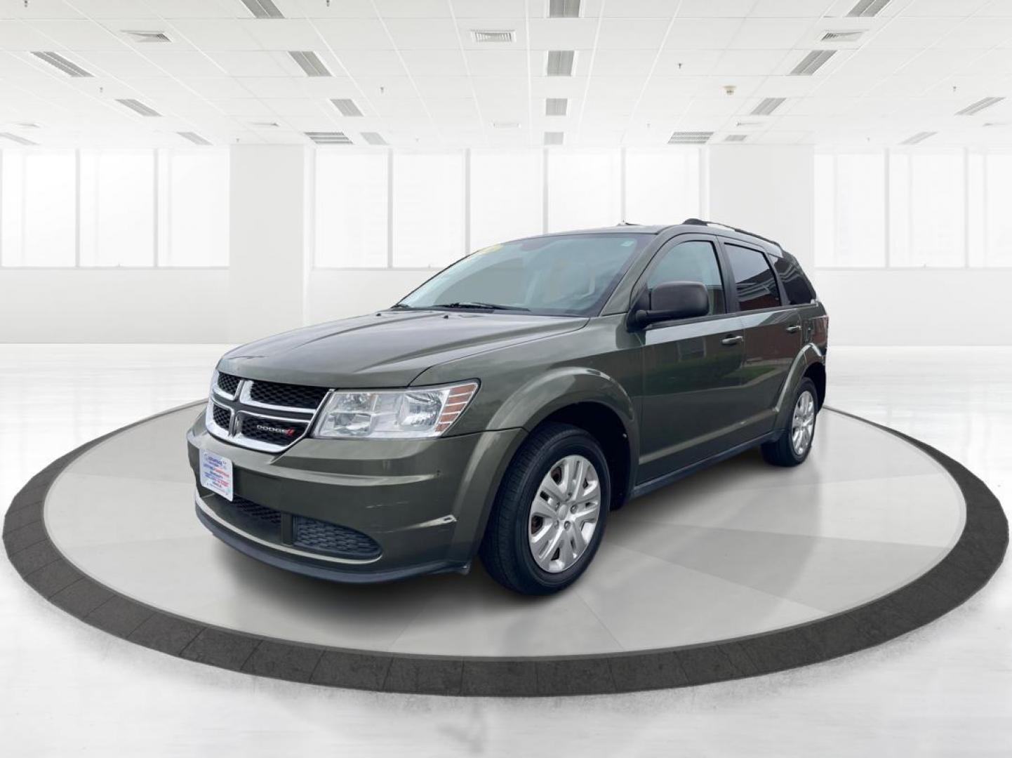 2016 Granite Crystal Metallic Clear Coat Dodge Journey SE (3C4PDCAB6GT) with an 2.4L L4 DOHC 16V engine, 4A transmission, located at 880 E. National Road, Vandalia, OH, 45377, (937) 908-9800, 39.892189, -84.181015 - Photo#7