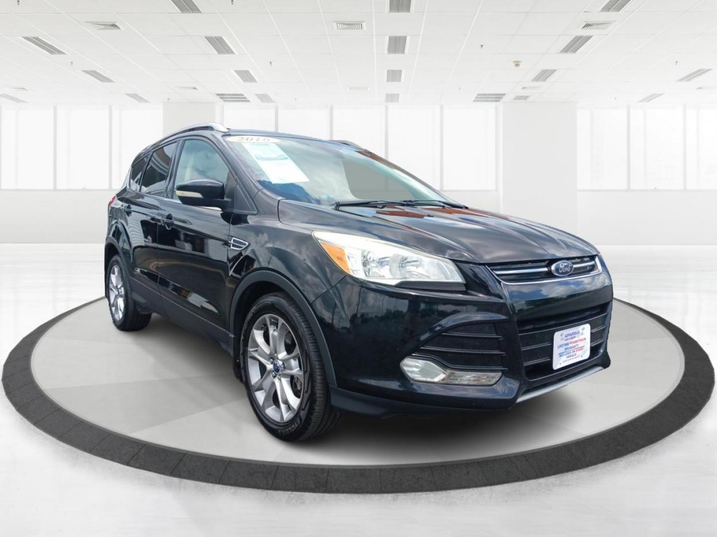 2016 Shadow Black Ford Escape (1FMCU9J9XGU) with an 2.0L L4 DOHC 16V engine, 6-Speed Automatic transmission, located at 1951 S Dayton Lakeview Rd., New Carlisle, OH, 45344, (937) 908-9800, 39.890999, -84.050255 - Photo#0