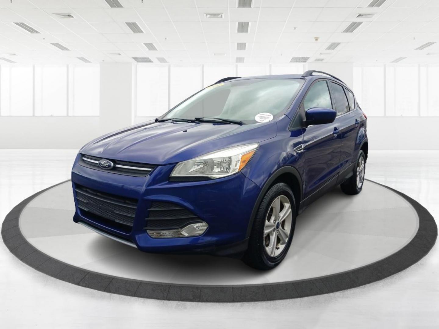 2016 Deep Impact Blue Metallic Ford Escape SE 4WD (1FMCU9G9XGU) with an 2.0L L4 DOHC 16V engine, 6-Speed Automatic transmission, located at 880 E. National Road, Vandalia, OH, 45377, (937) 908-9800, 39.892189, -84.181015 - Photo#7